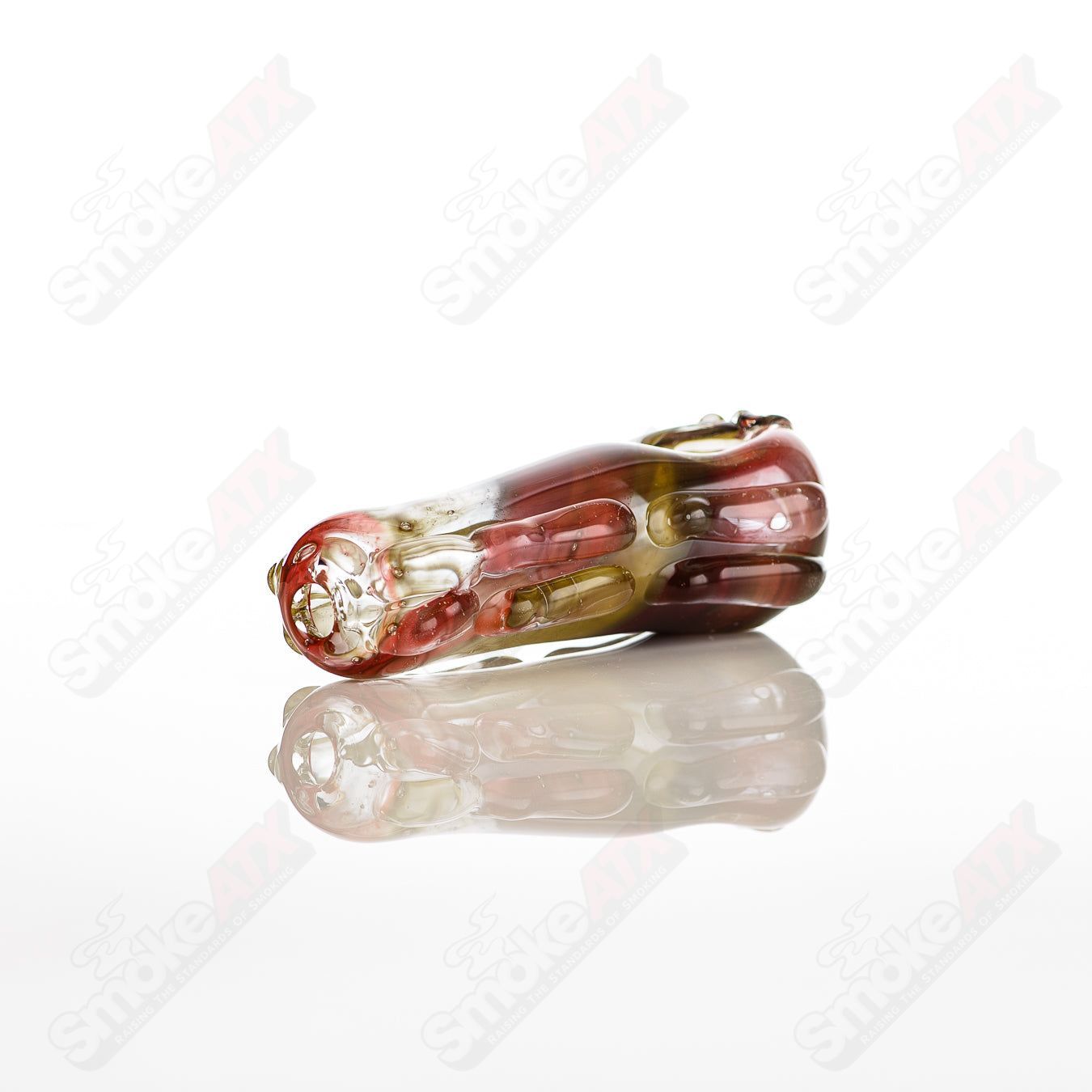 Glass pipe titled #8 Spoon Glass by Nobody, clear glass with a smooth curved bowl and elongated stem, designed for smoking.