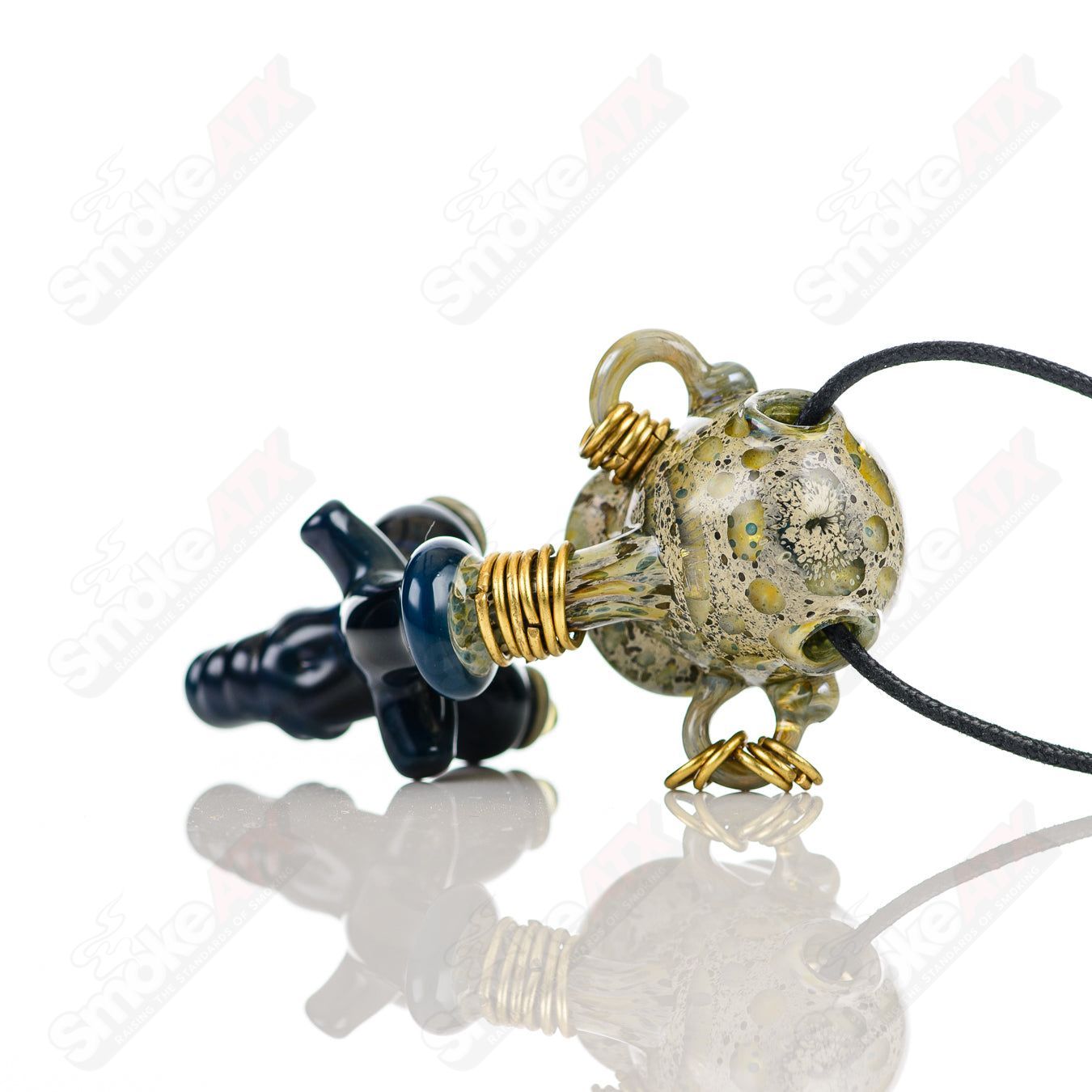Bufo Alien Bondage Slave Pendant made of heady glass featuring an alien design with bondage details.