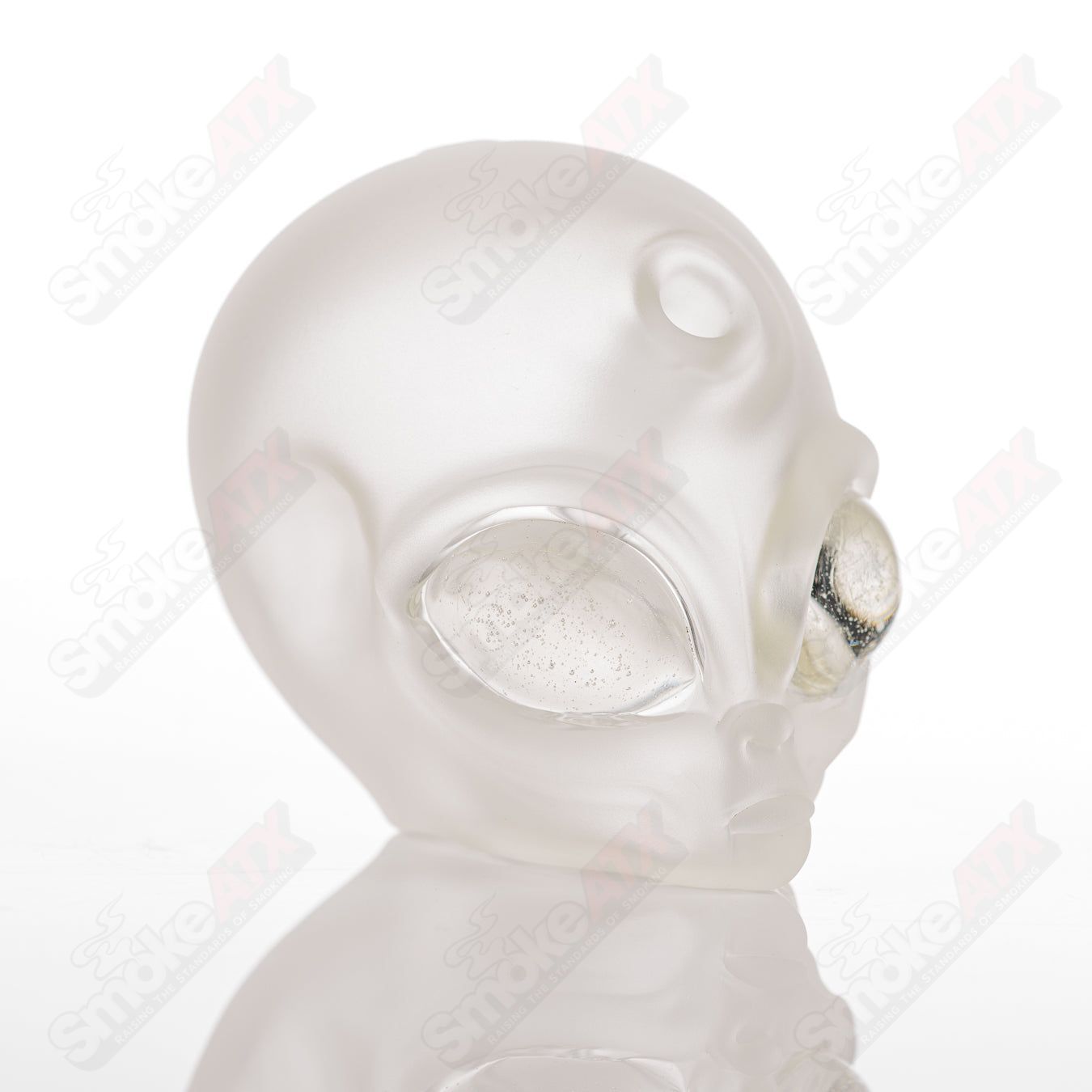 Alien Traveler Ghost Glass heady concentrate rig with intricate alien and ghost design, featuring clear glass and colorful accents.