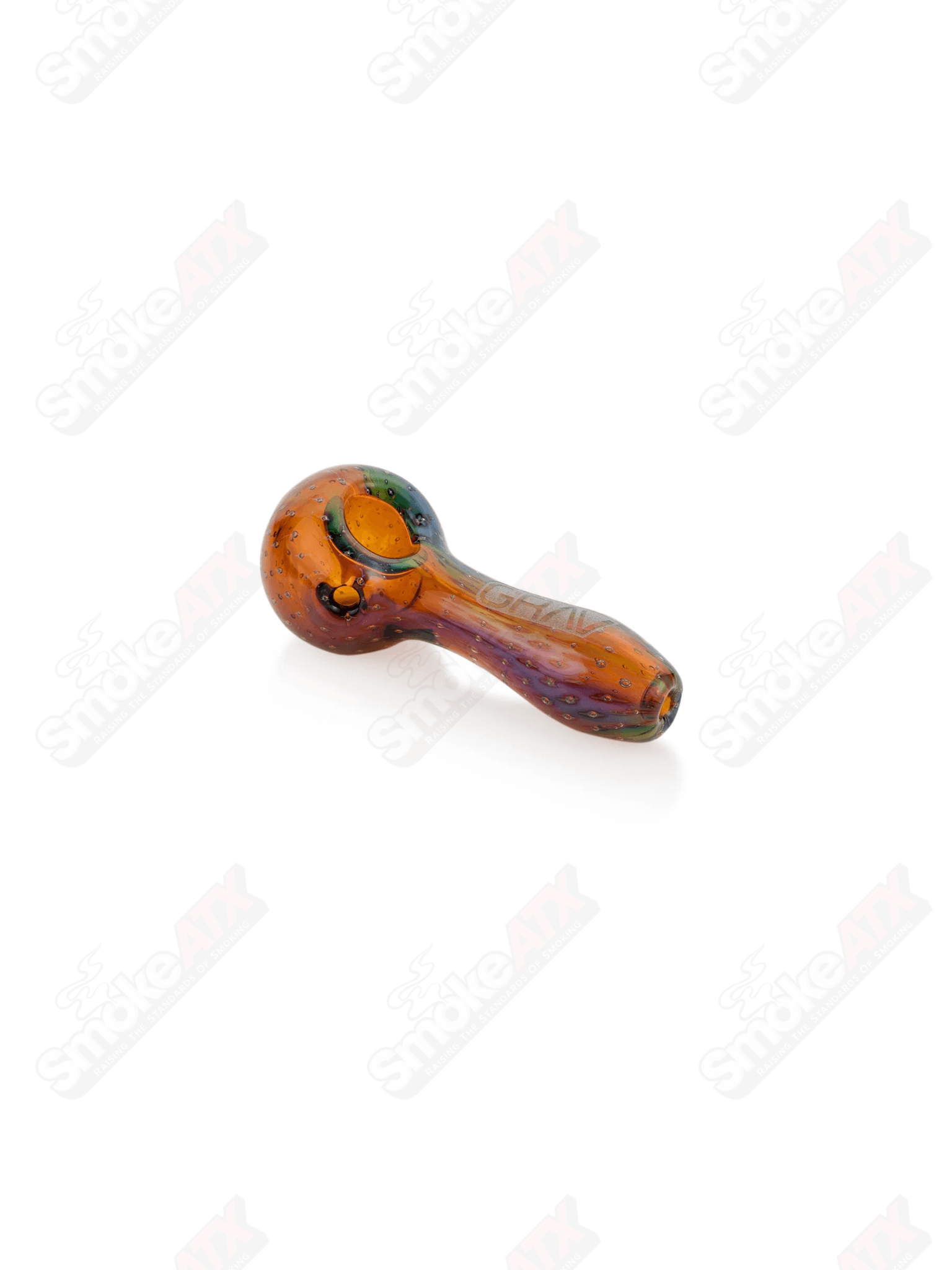 Amber Bubble Trap Spoon glass pipe by Grav with a distinctive amber bubble design and smooth bowl for smoking.