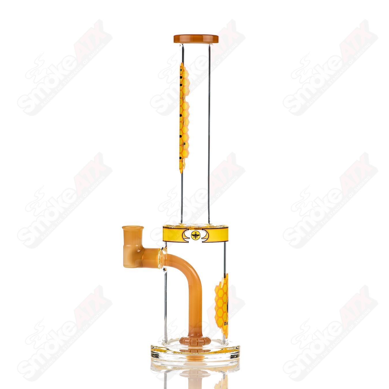 Illadelph honeycomb straight tube waterpipe rig with glass construction and intricate honeycomb design.
