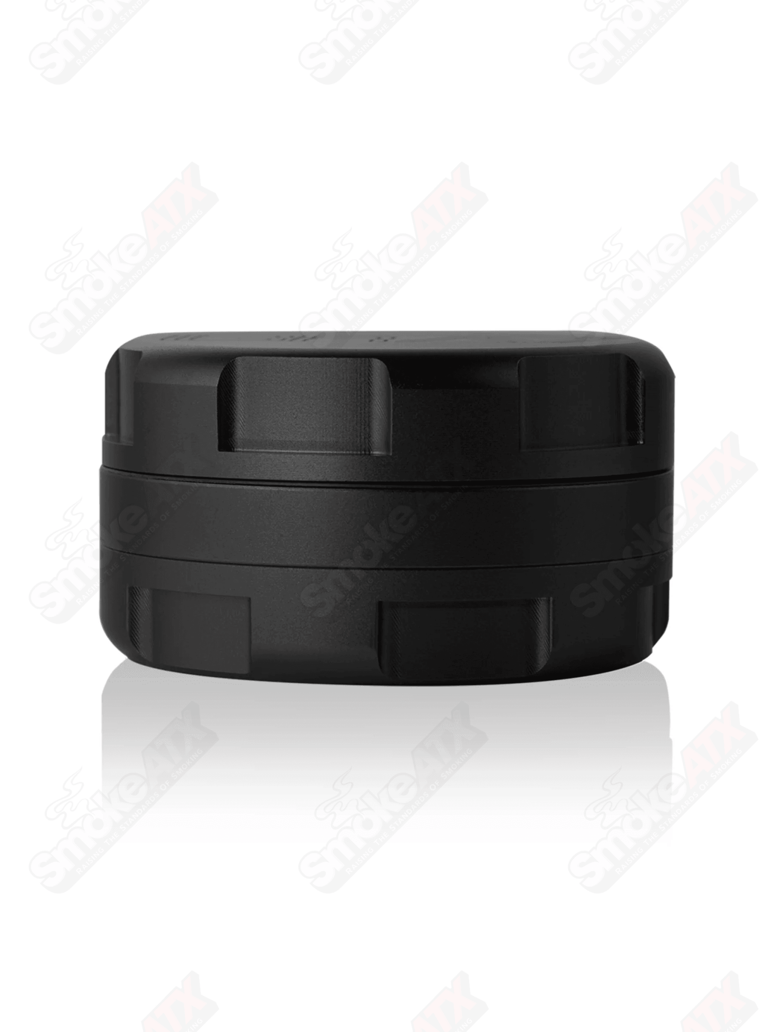 Black Grav 3-piece 1.25-inch metal grinder with textured surface, designed for smooth grinding and easy handling.