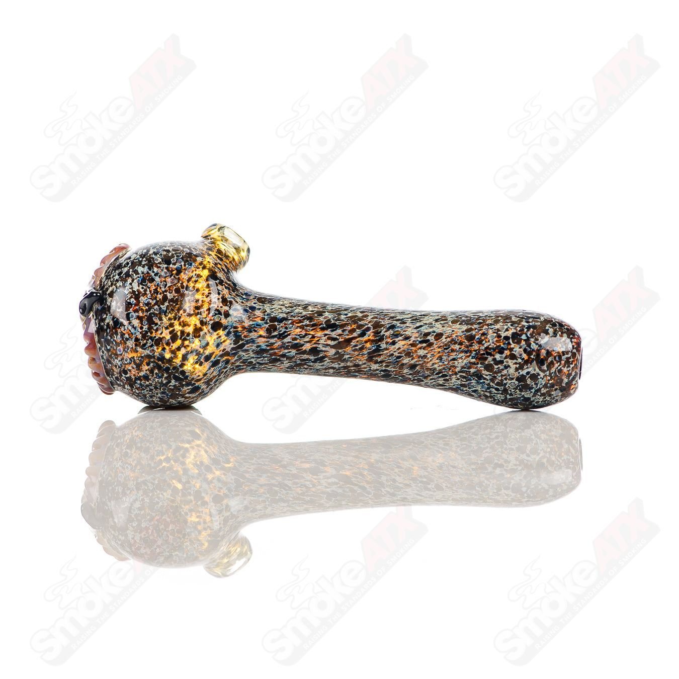 Black spotted owl glass pipe by Four Winds Flameworks featuring detailed owl design and smooth glass finish.