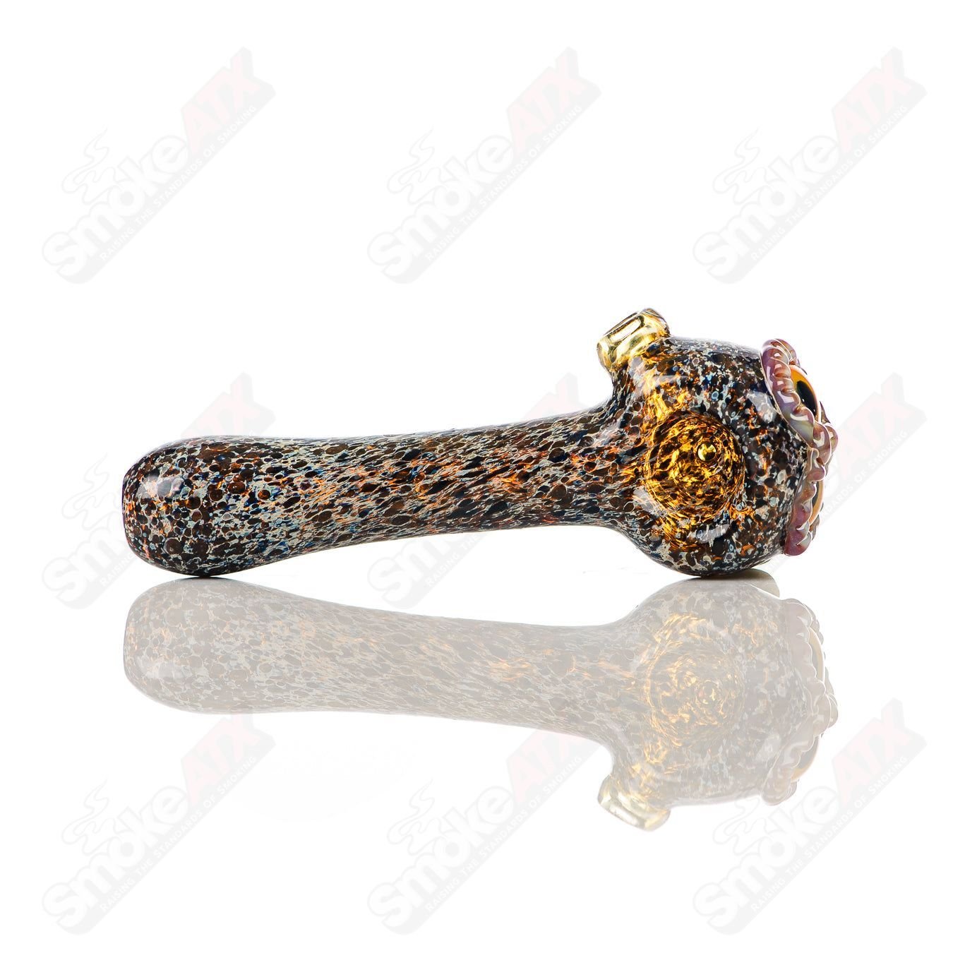 Black spotted owl glass spoon pipe by Four Winds Flameworks, detailed ceramic design with a black and spotted owl motif.