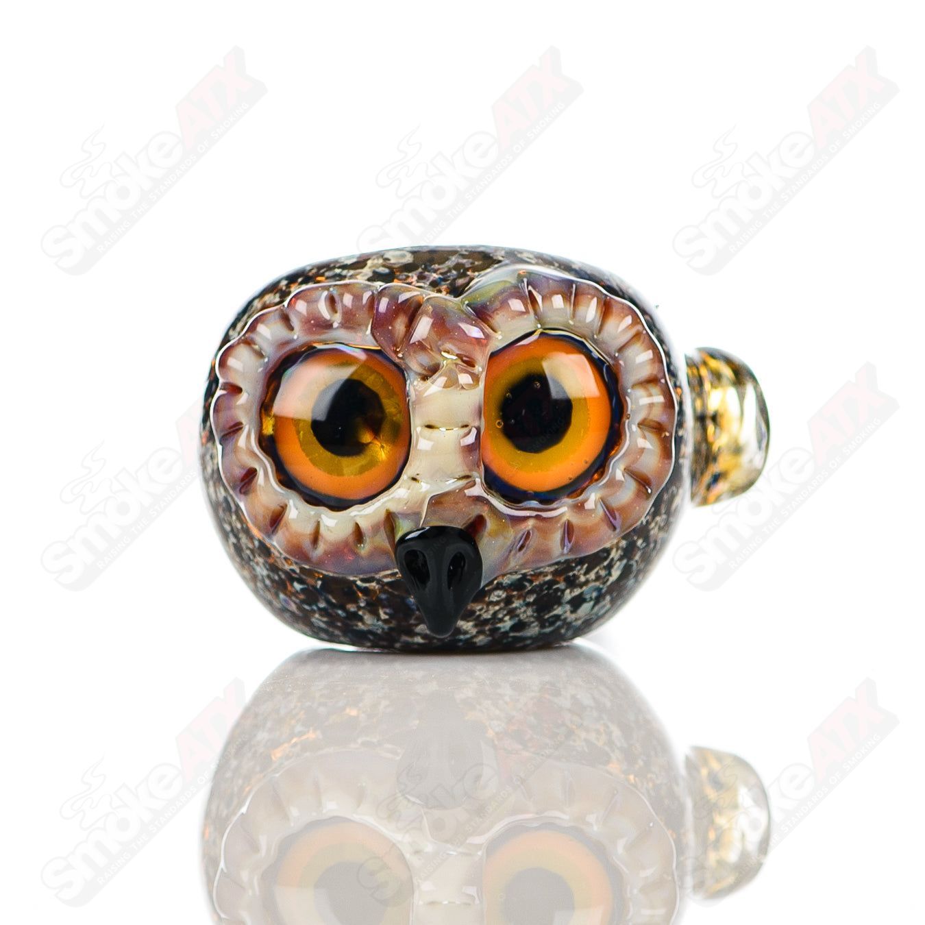 Black spotted owl glass spoon pipe by Four Winds Flameworks, featuring detailed owl design and smooth glass craftsmanship.