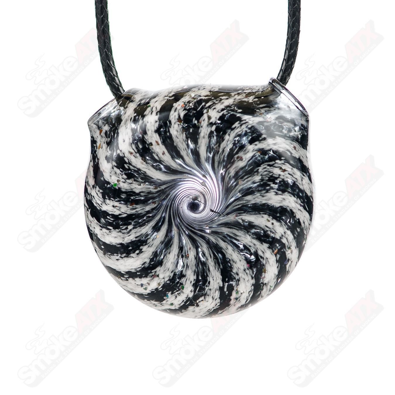 Black and white dichro pendant made of glass by Merican Made, featuring a vibrant, reflective design on a sleek pendant.