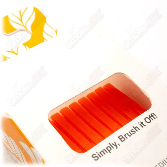Smoke ATX CannaBrush trimming brush used for cannabis plant trimming, featuring durable bristles and ergonomic handle.