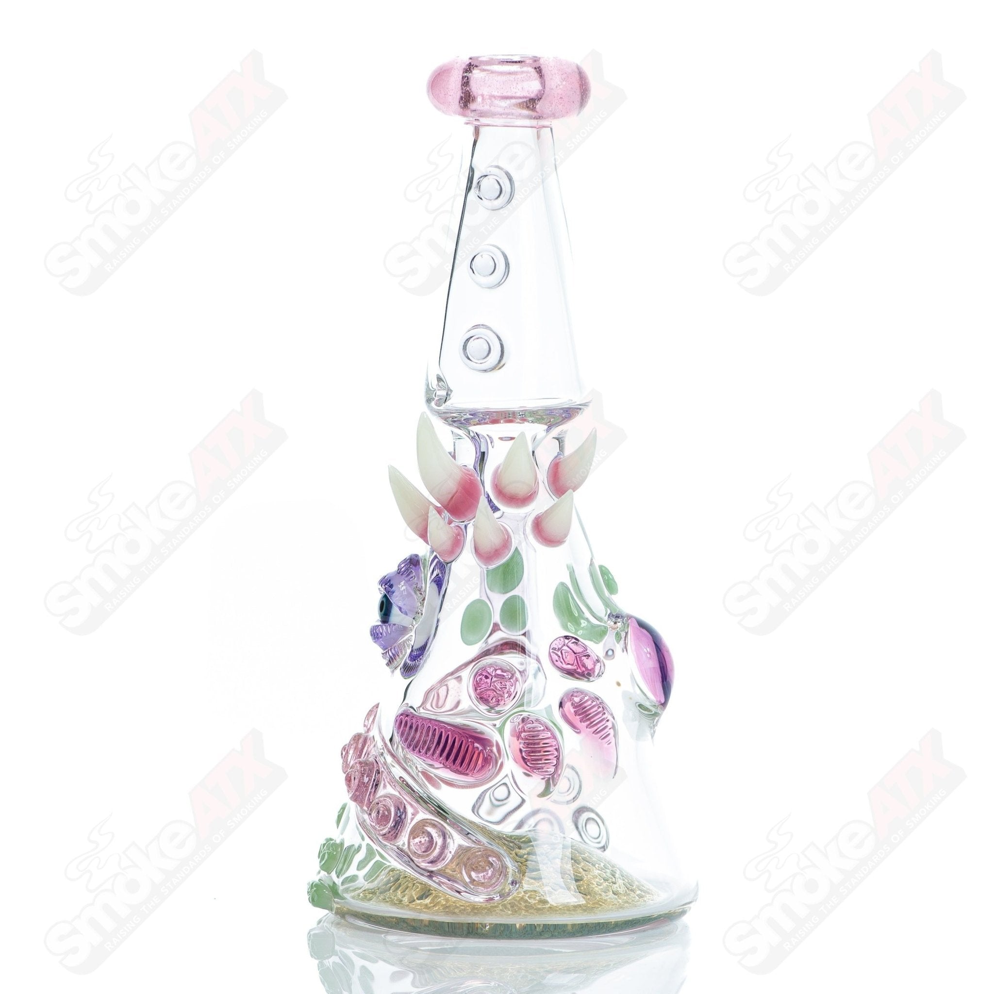CFL Rip Curl Helix Salt Glass heady glass concentrate rig with colorful rip curl design and intricate glass details.