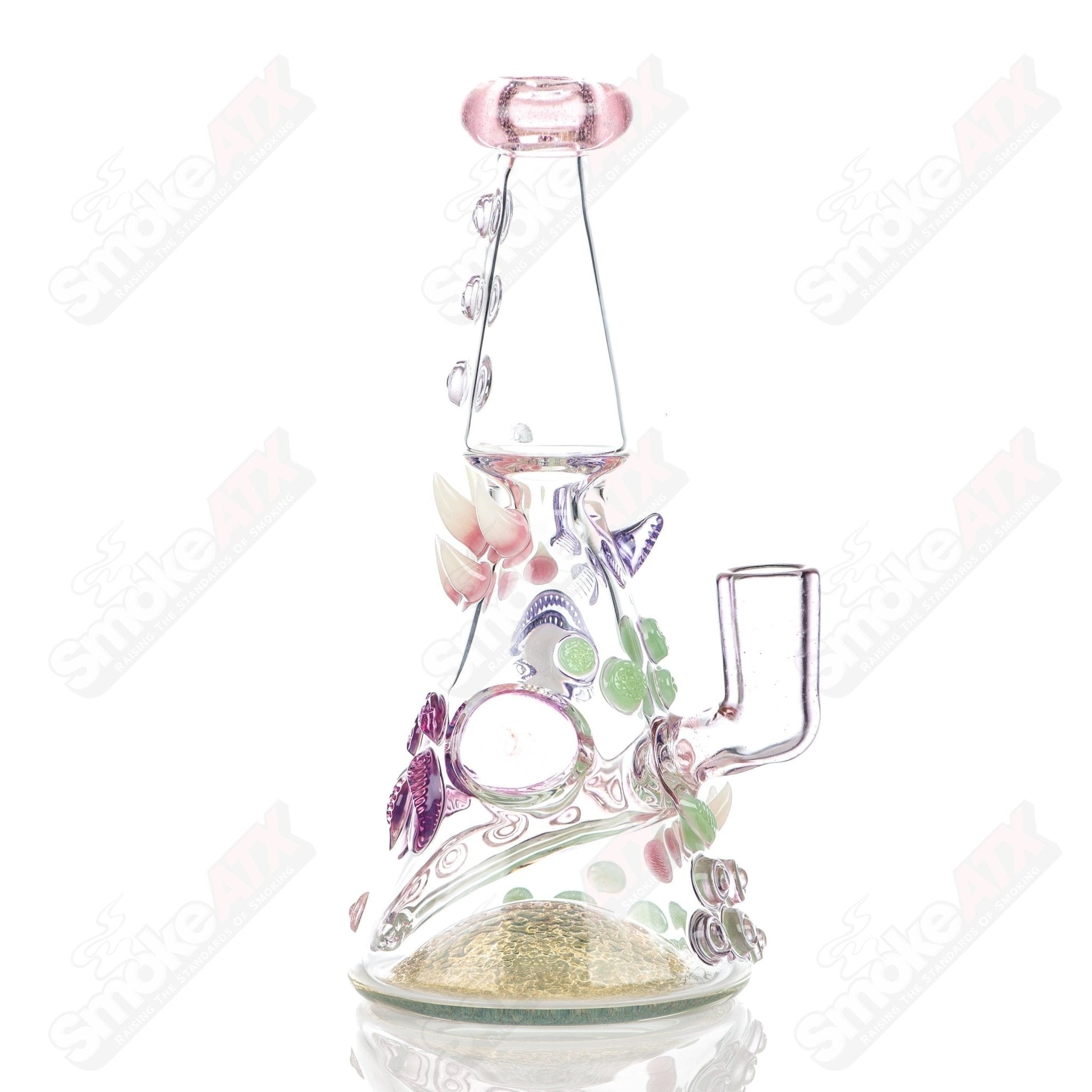 CFL Rip Curl concentrate rig by Salt Glass, Helix & SALT Glass, featuring a colorful heady glass design for dry concentrates.