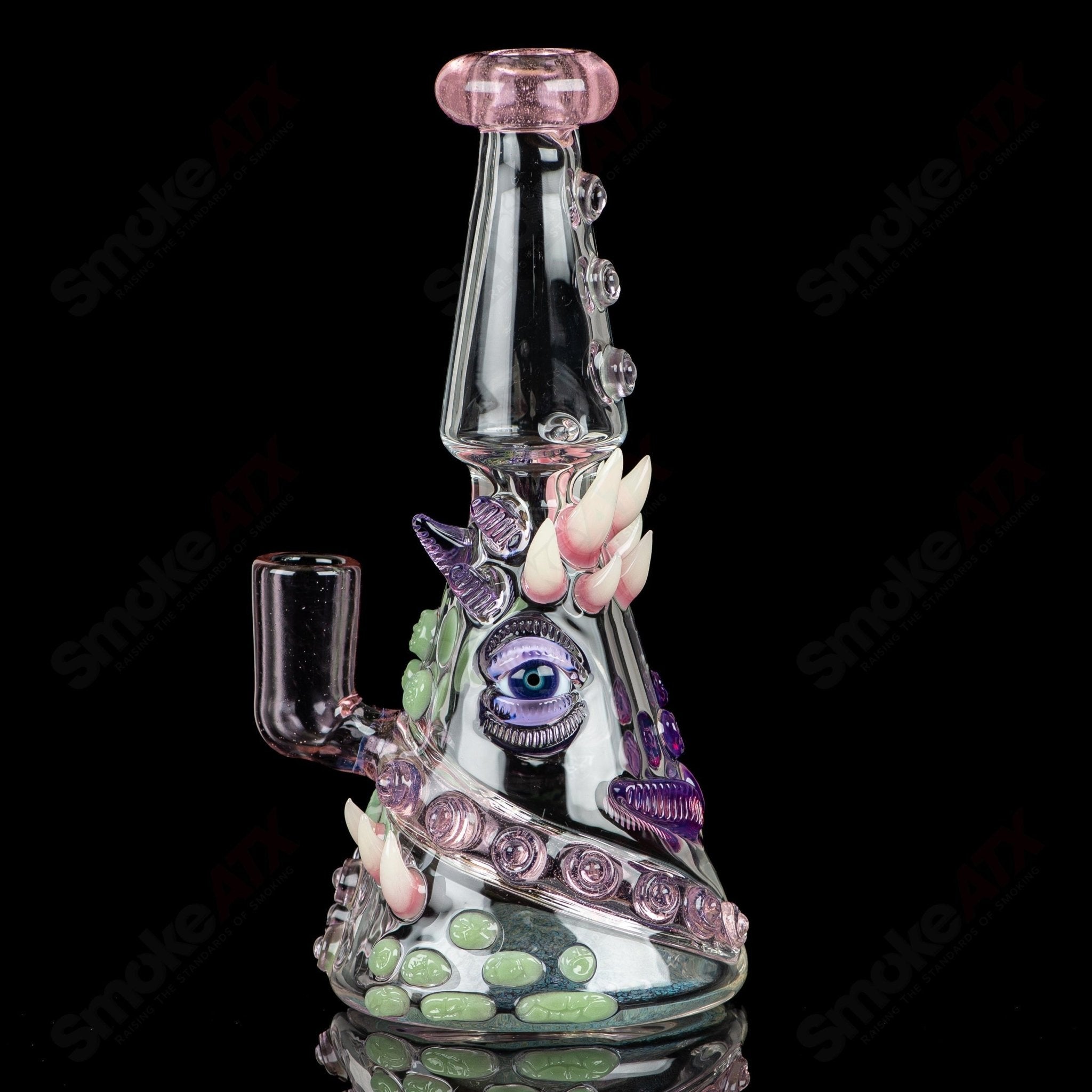 CFL Rip Curl concentrate rig by Salt Glass, Helix & SALT brand, featuring a colorful heady glass design with intricate details.