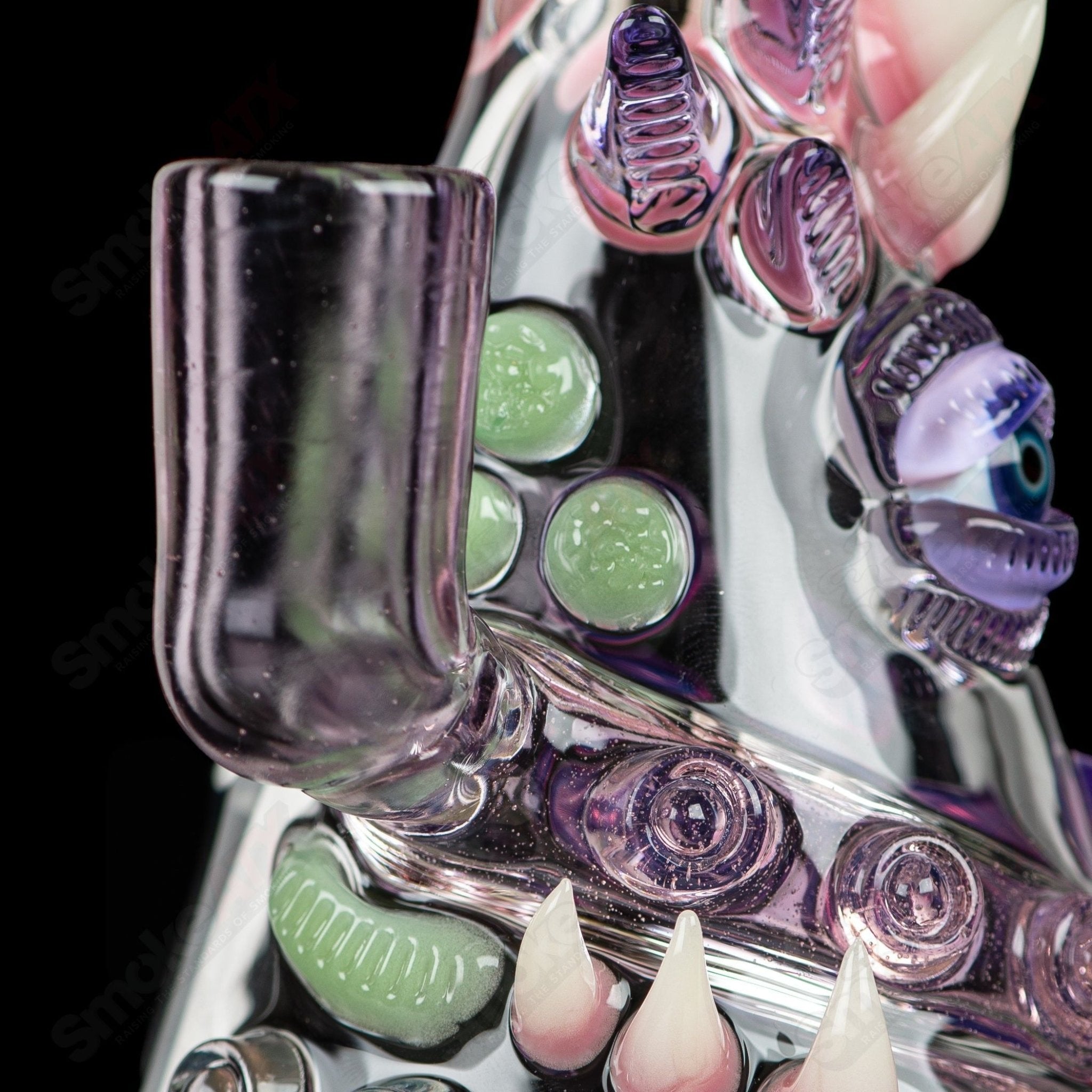 CFL Rip Curl by Helix Salt Glass, a colorful concentrate rig with rip curl design, made of sturdy heady glass for dabbing.