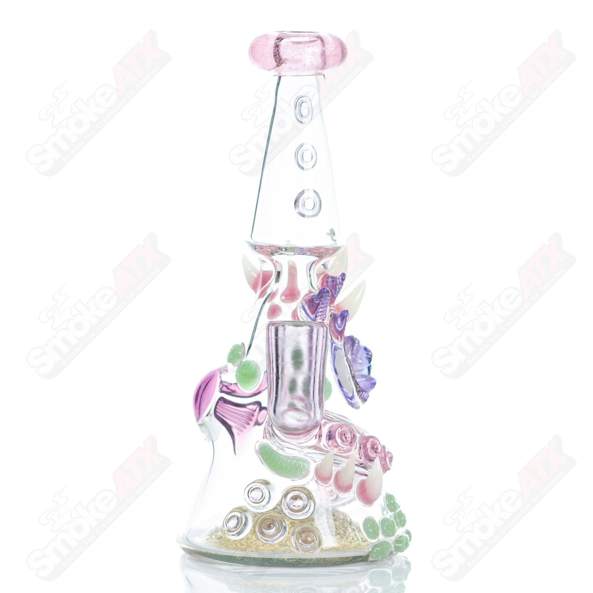 CFL Rip Curl concentrate rig by Salt Glass, Helix & SALT Glass, clear heady glass with intricate design and durable construction.