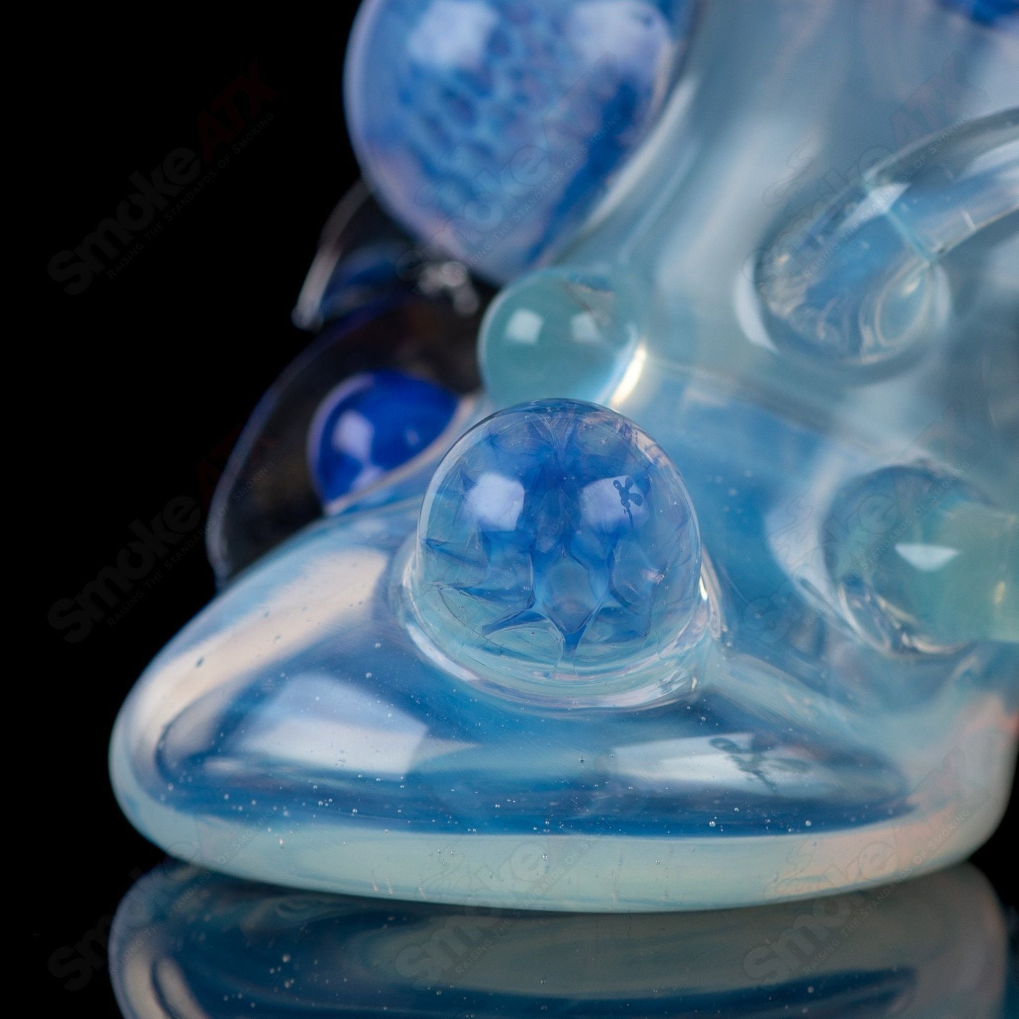 Sven Glass Sherlock chillum set featuring a clear heady glass with intricate Sherlock-style design and a compact, portable shape.