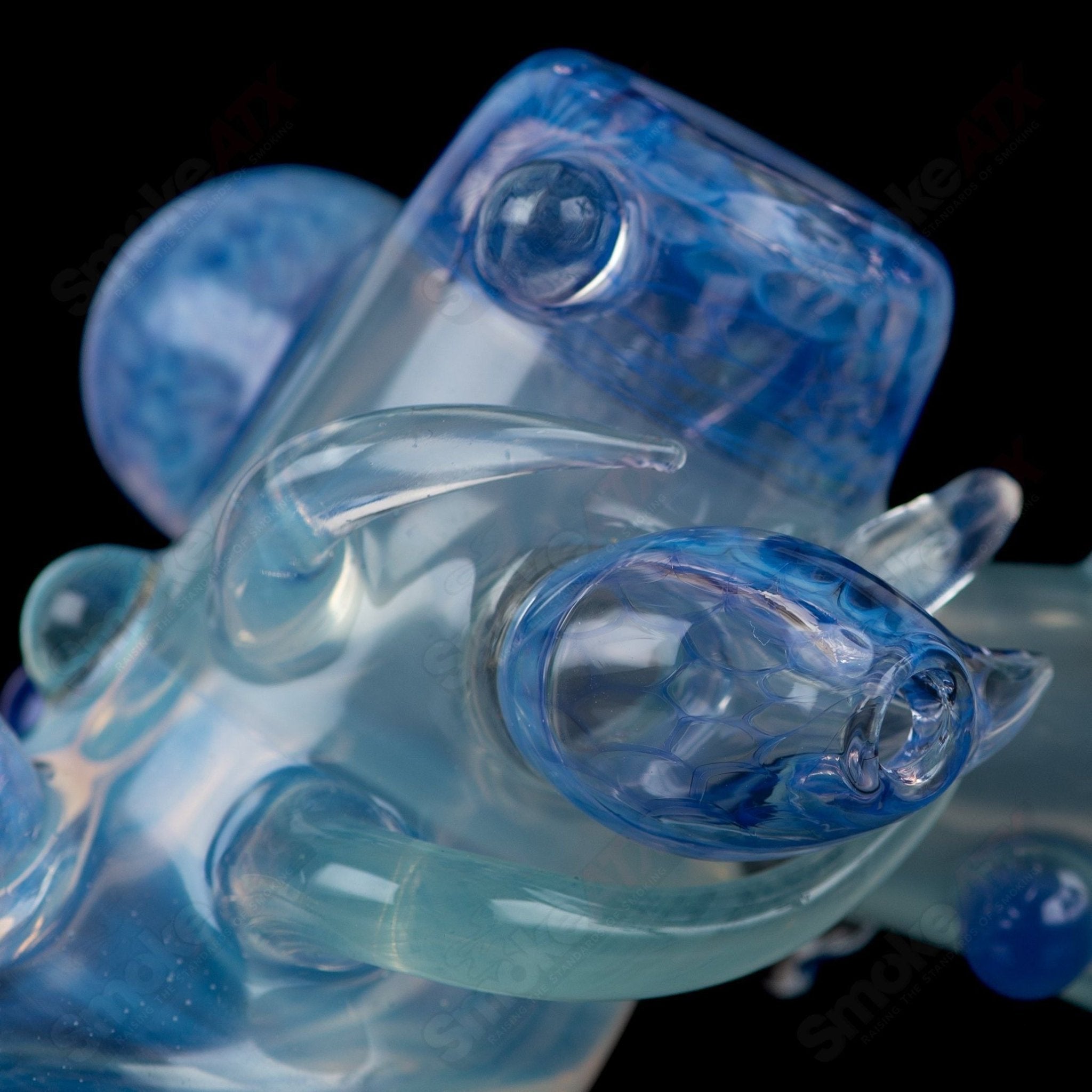 Sven Glass Sherlock chillum set featuring colorful heady glass with intricate designs and a classic Sherlock shape.