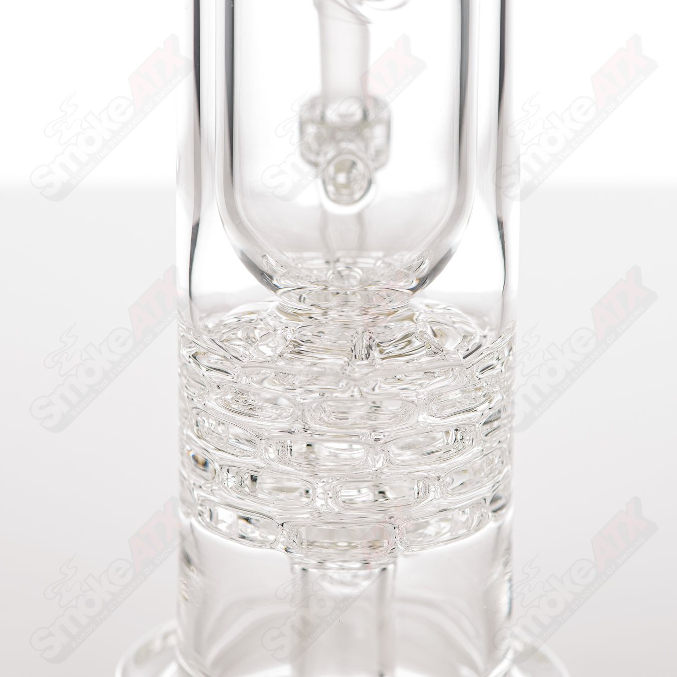 Clear Brickstack Incycler Leisure glass concentrate rig with multiple chambers and intricate design for enhanced smoking experience