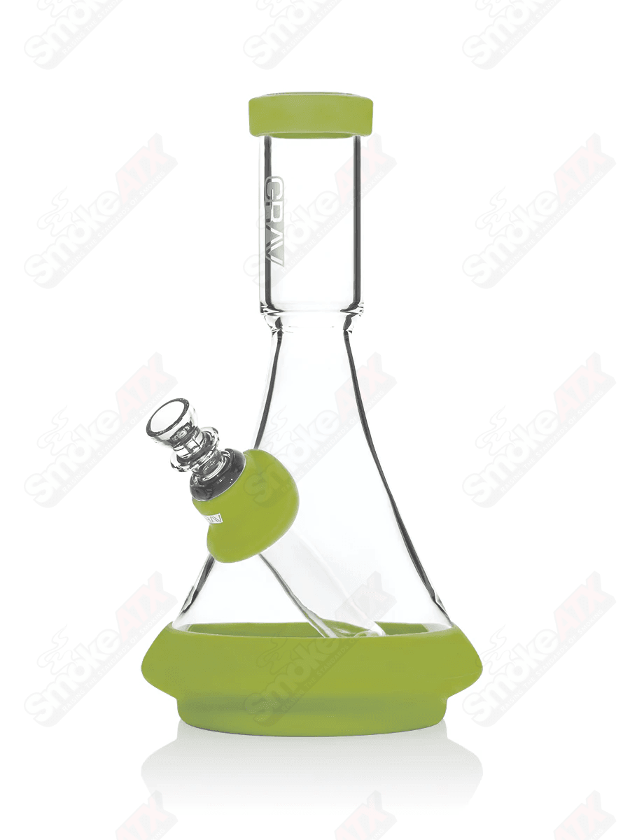 Clear and avocado green deco beaker waterpipe by Grav Labs with silicone accents, featuring a sleek glass design.