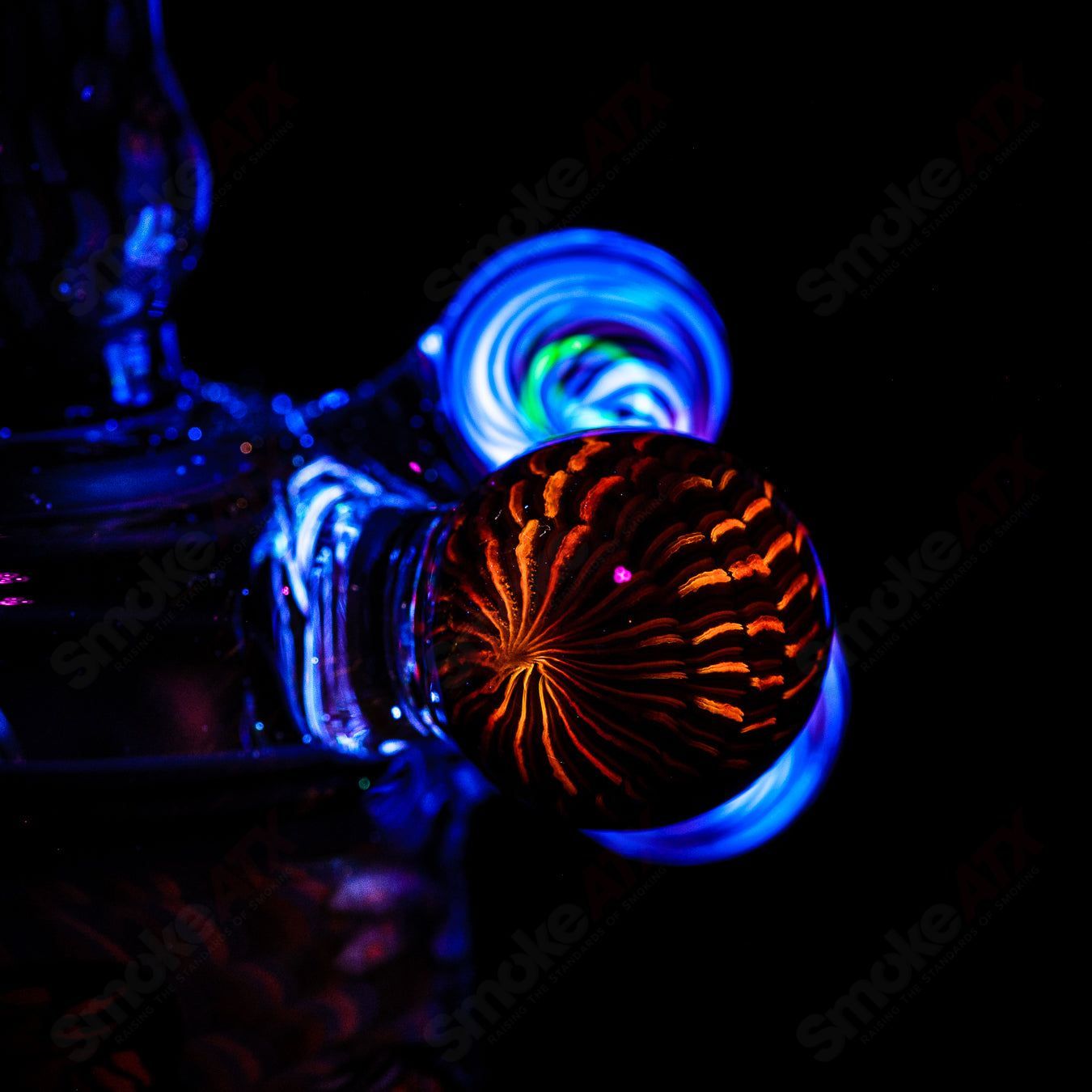Coiled Latticello Milli Rig by Conversion Glass, a heady concentrate rig with intricate glasswork and colorful design.