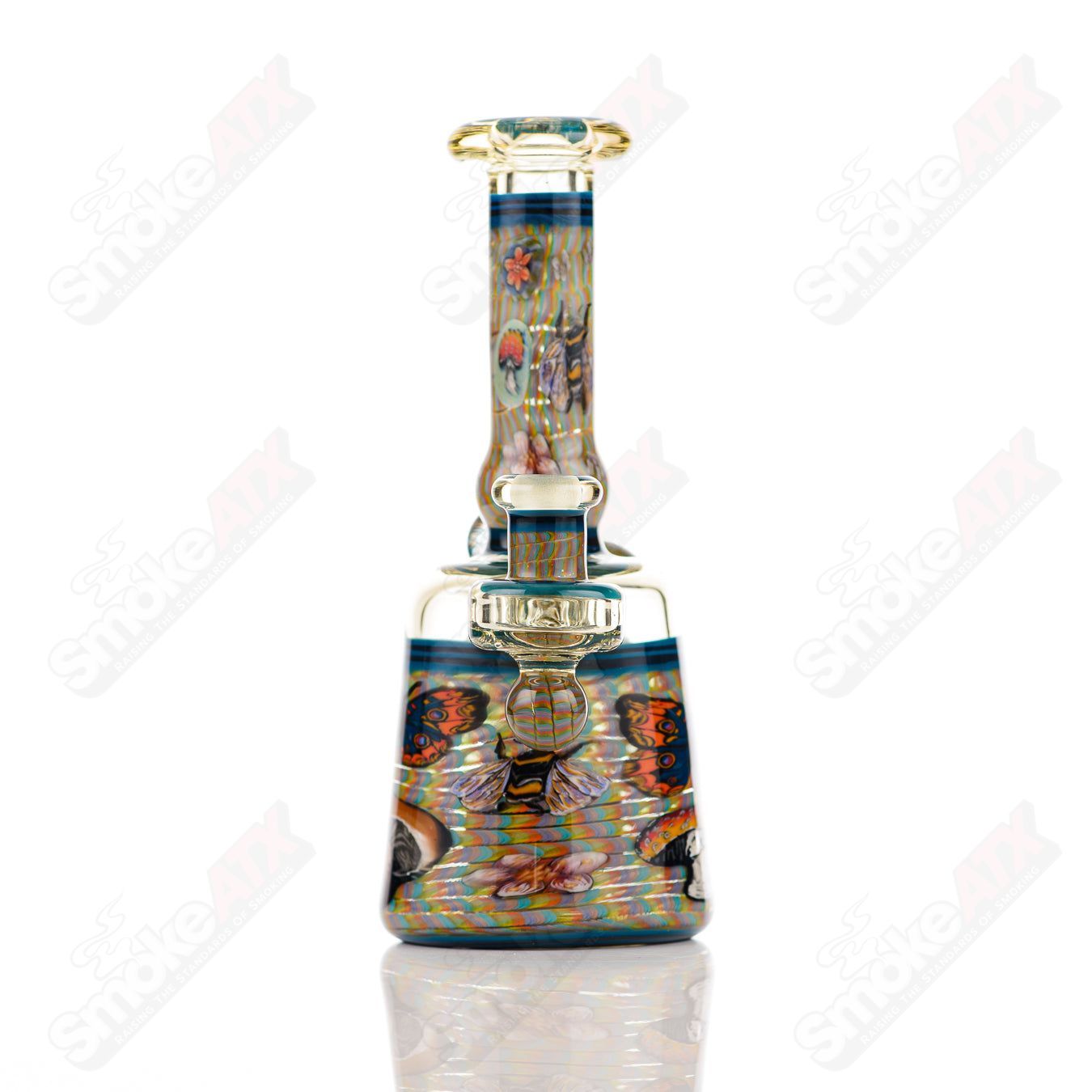 Coiled Latticello Milli Rig by Conversion Glass, a heady concentrate rig with intricate glasswork and detailed design.