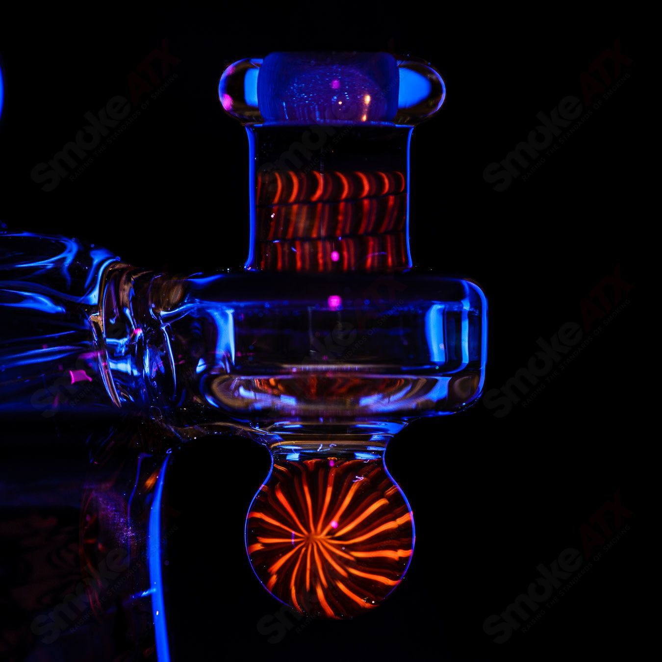 Coiled Latticello Milli Rig by Conversion Glass, a heady glass concentrate rig with intricate coil design and clear glass accents.