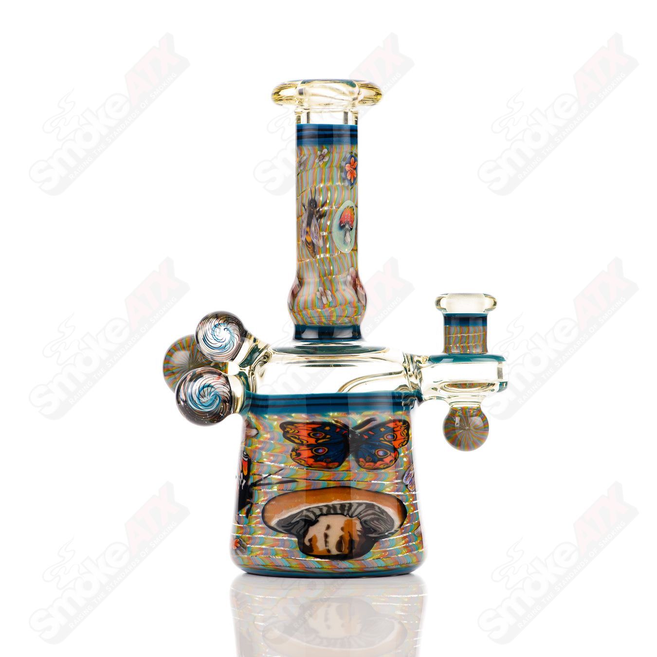 Coiled Latticello Milli Rig by Conversion Glass, a heady concentrate rig with intricate glasswork, designed for concentrate vaporization.