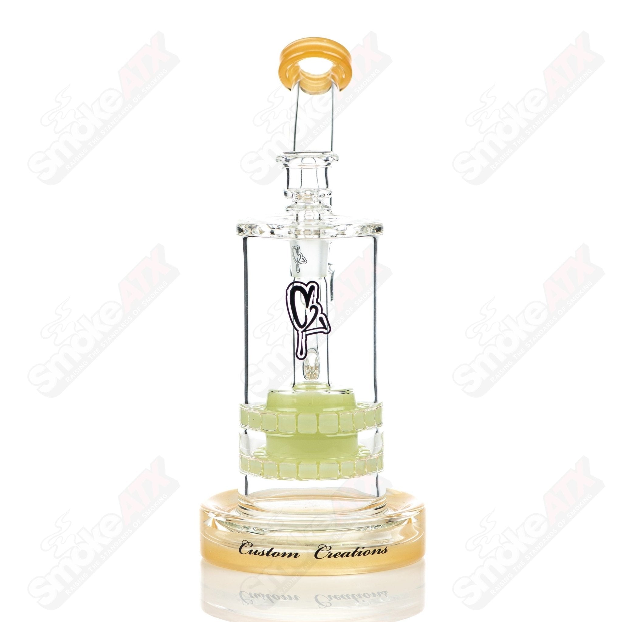 Color 65mm double ratchet bubbler by C2 Custom Creations, glass water pipe with vibrant colors and ergonomic design.