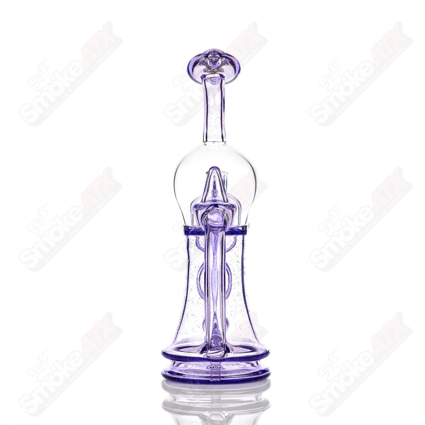 Colored Bubble Dumper Reed Glass concentrate rig with vibrant glass design and intricate bubble patterns, crafted by Reed Glass.