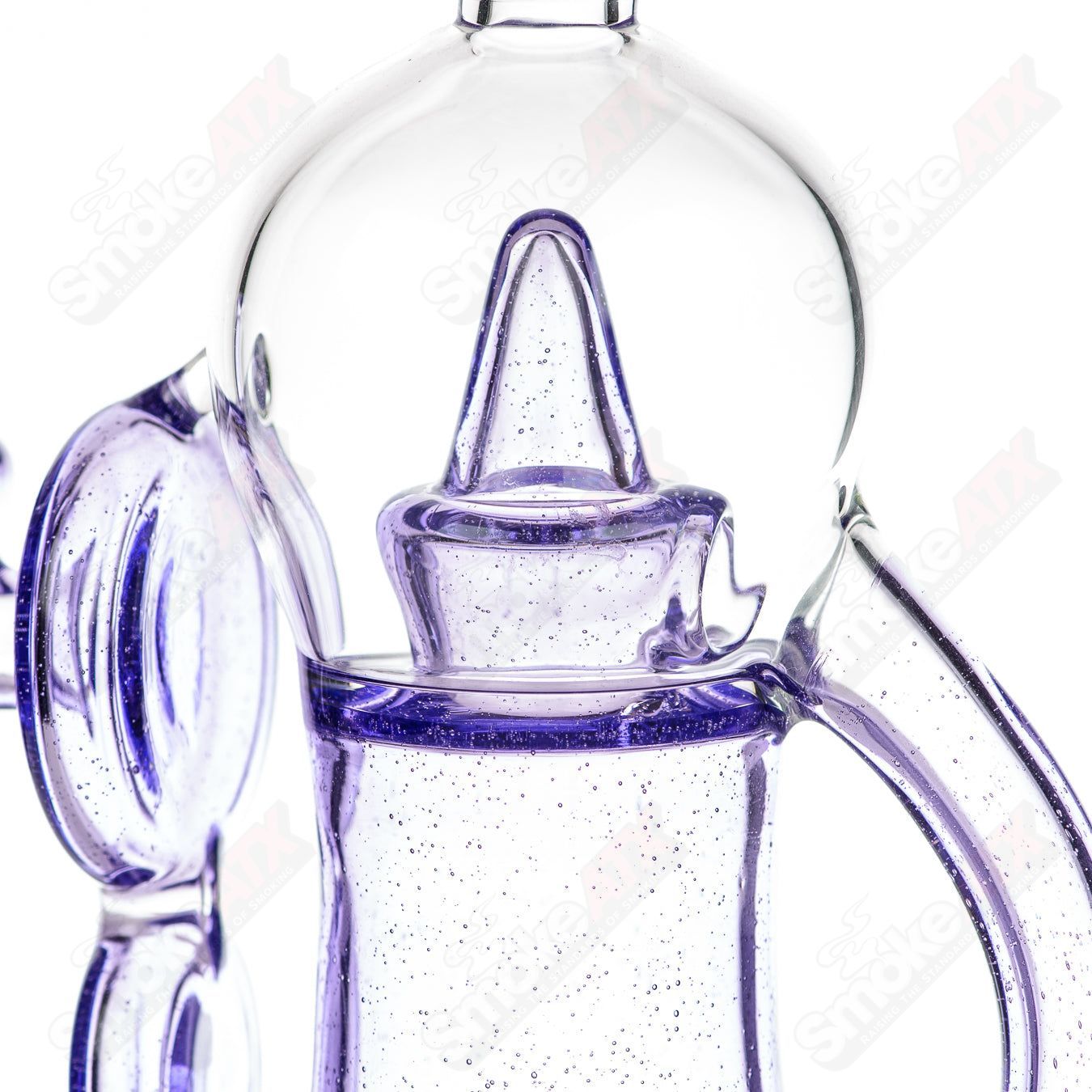 Colored Bubble Dumper Reed Glass concentrate rig with vibrant glass design, featuring a clear glass body and colorful bubble accents.