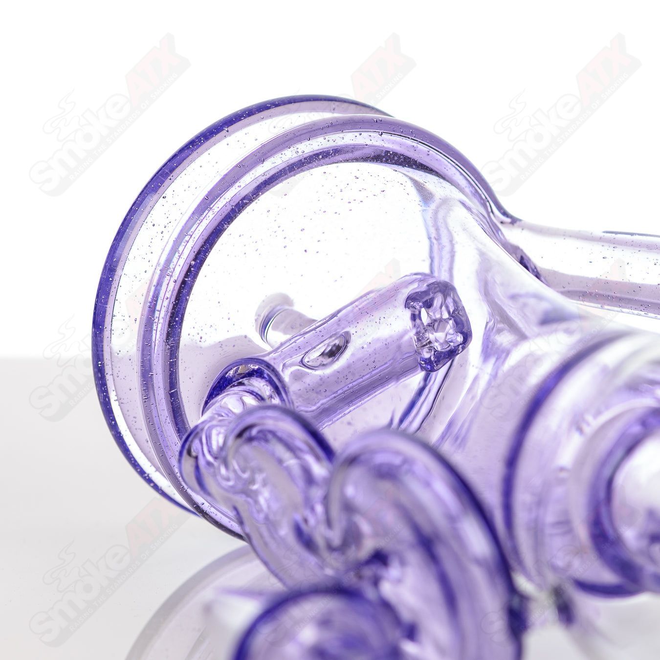 Colorful Bubble Dumper Reed Glass concentrate rig with vibrant bubble designs, crafted by Reed Glass for smooth dabbing experiences.