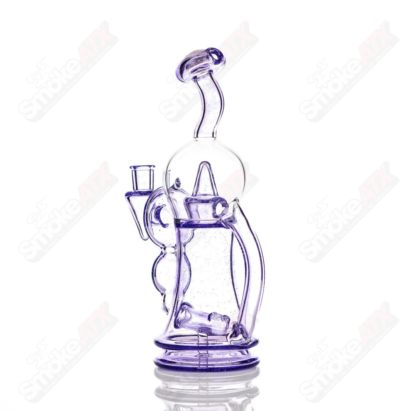 Colored Bubble Dumper Reed Glass concentrate rig featuring vibrant glass with bubble accents and a sleek design.