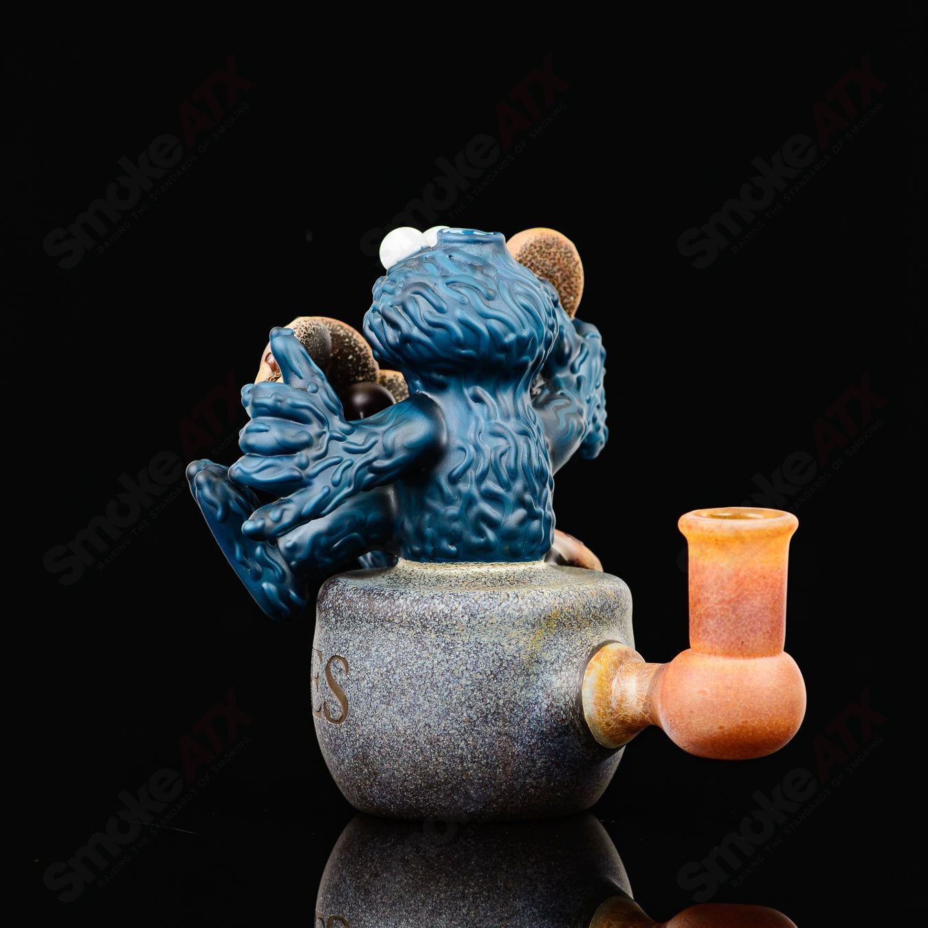 Cookie Monster Morrison Glass, a colorful heady glass concentrate rig featuring a Cookie Monster design by Robert Morrison.