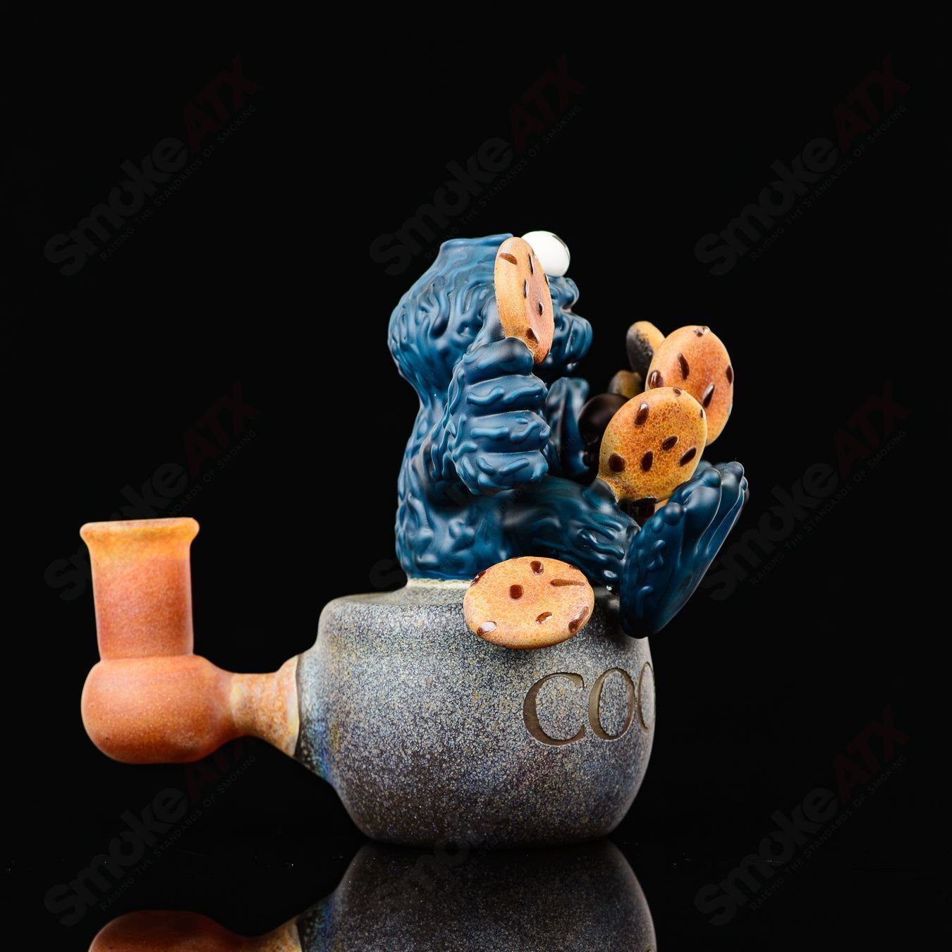 Cookie Monster Morrison glass concentrate rig by Robert Morrison, featuring a colorful, detailed Cookie Monster design for heady glass enthusiasts.