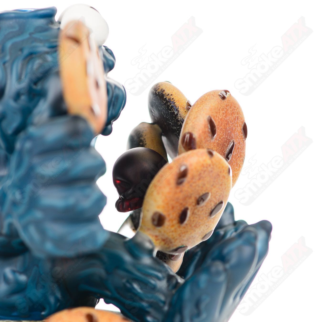 Colorful Cookie Monster Morrison glass concentrate rig by Robert Morrison with detailed character design and intricate glasswork.
