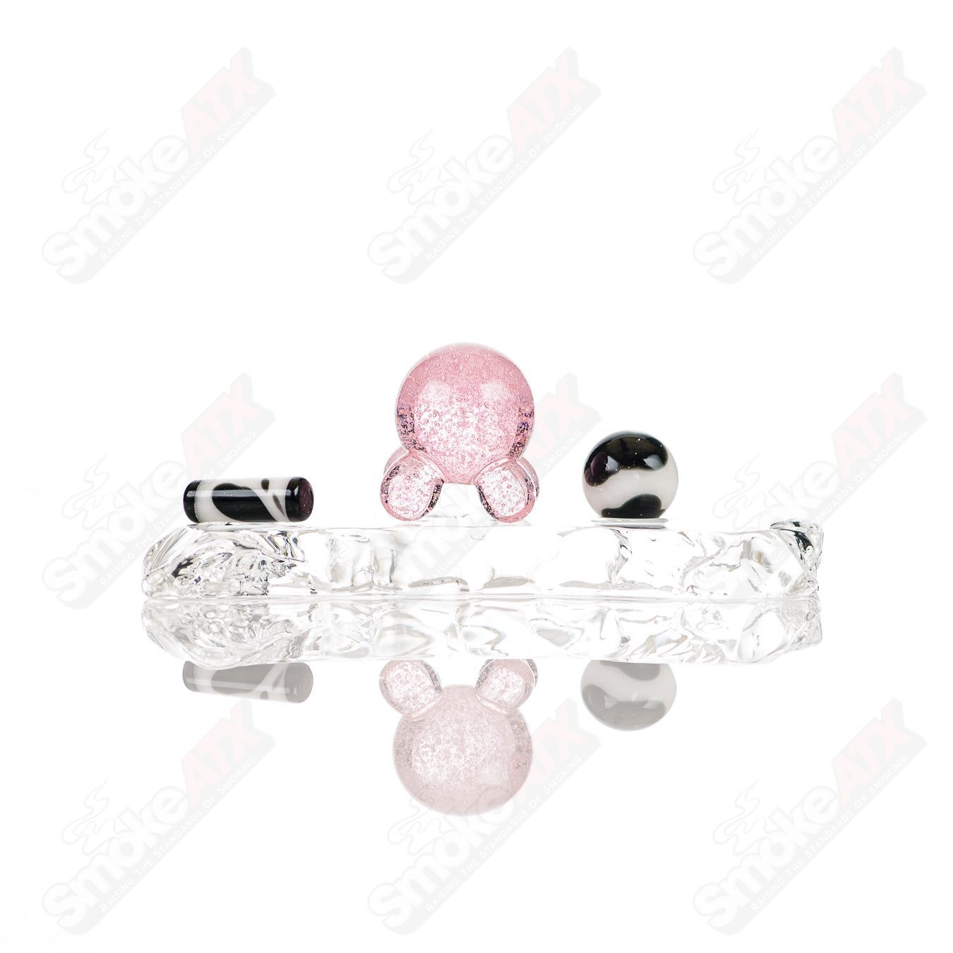 Glass cow slurper set from Adventures In Glass Blowing, featuring colorful glass tools and accessories for creative glass art projects.