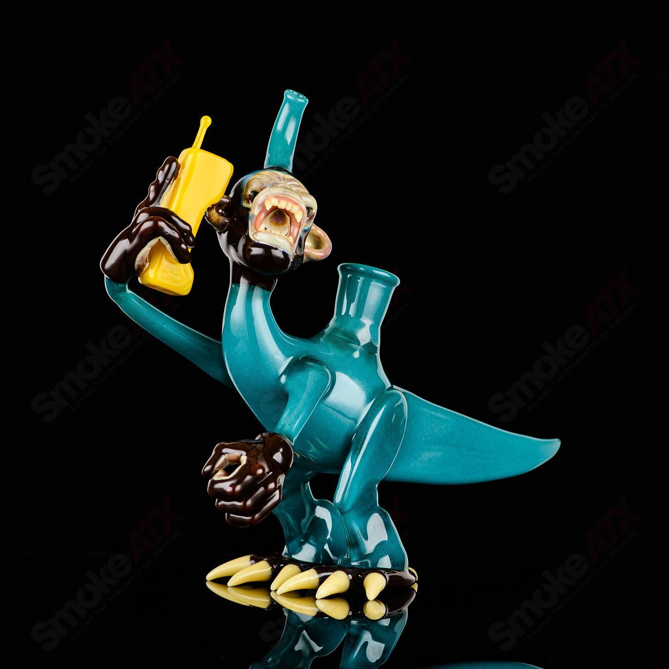 Elbo Glass Coyle x Elbo Dino Monkey heady glass concentrate rig with colorful dinosaur and monkey design.