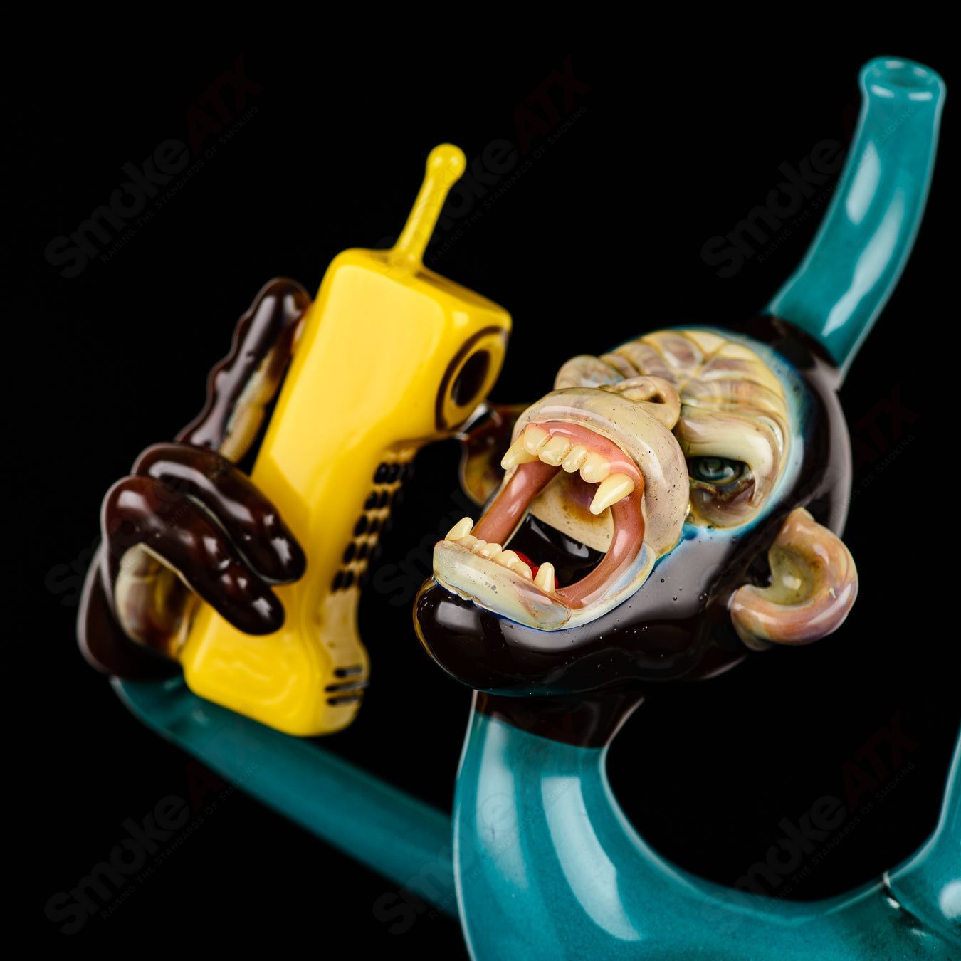 Elbo Glass Coyle x Elbo Dino Monkey heady glass concentrate rig with detailed dinosaur design and vibrant colors.