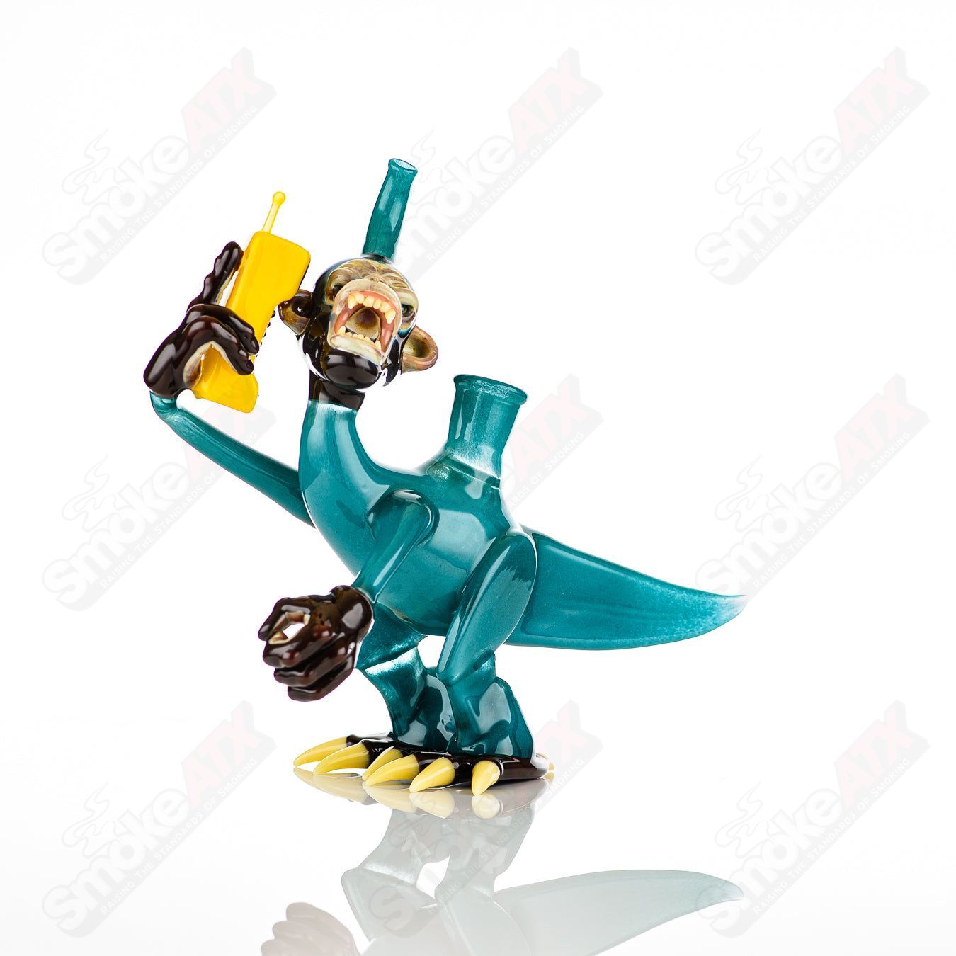 Elbo Glass Coyle x Elbo Dino Monkey heady glass concentrate rig with colorful dinosaur design and intricate details.