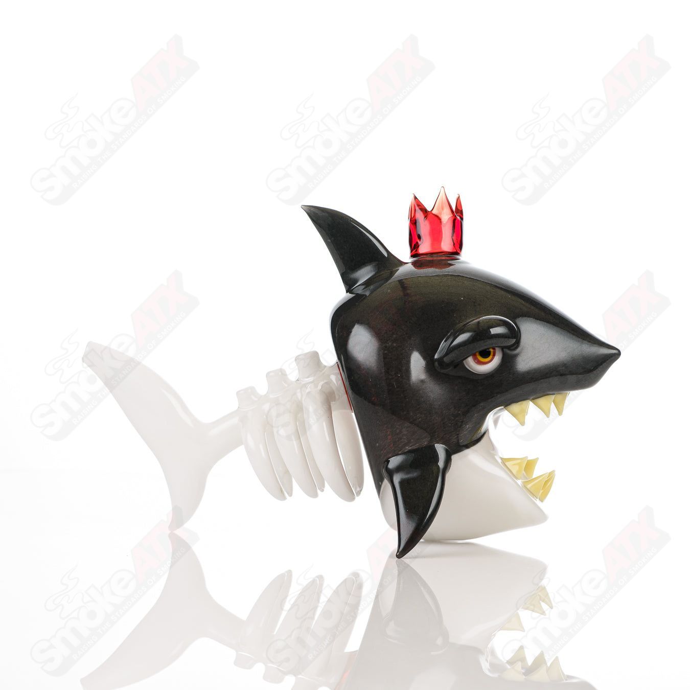 Niko Cray Crown Bones Shark heady glass concentrate rig with intricate blue and white design and shark motif.
