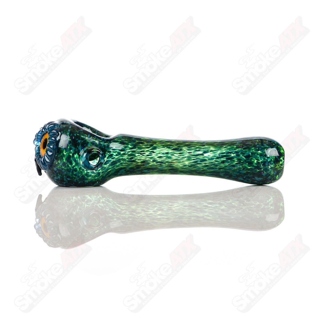 Cyan spotted owl glass spoon pipe by Four Winds Flameworks, featuring detailed owl design and vibrant colors.