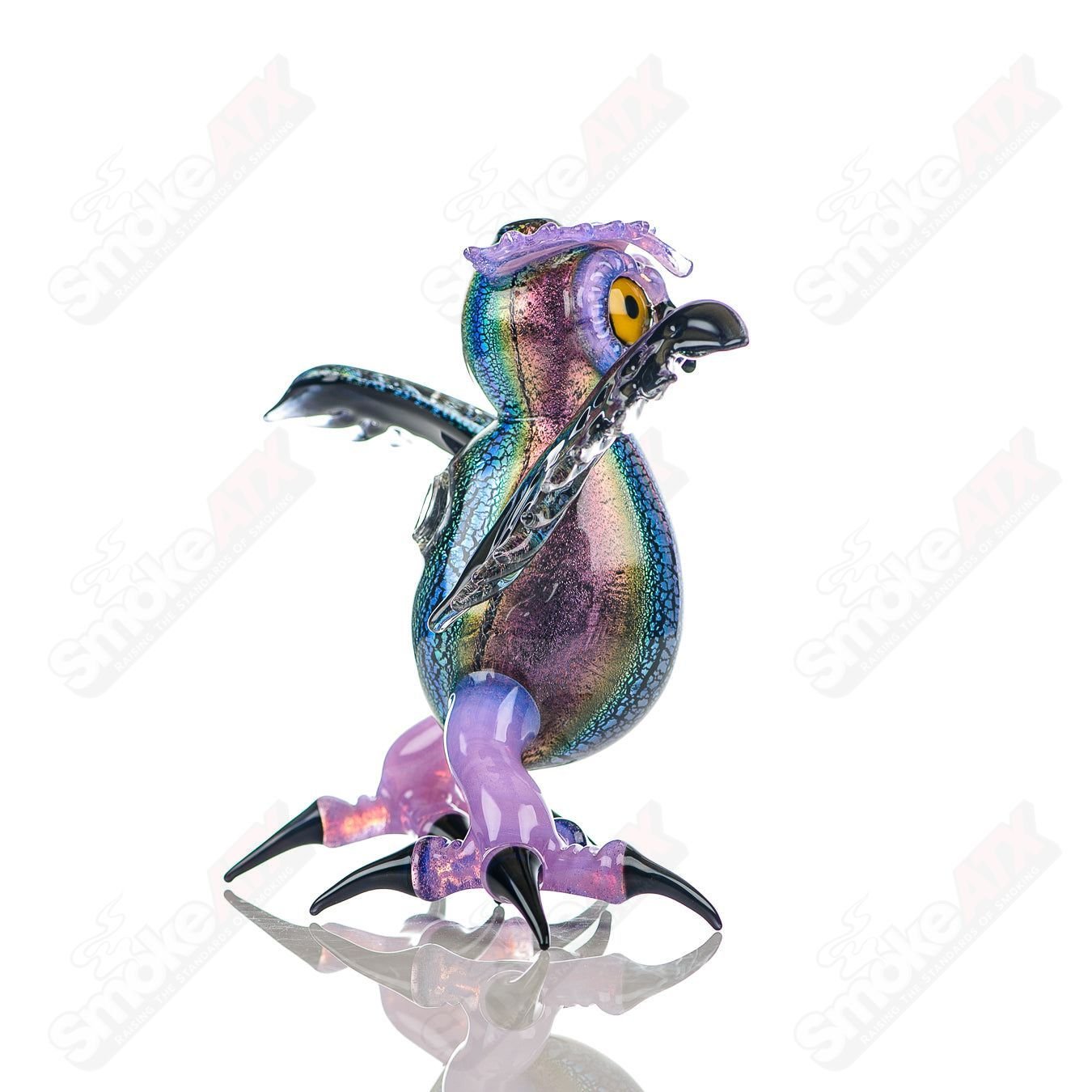 Colorful Dichro EDM Owl heady glass concentrate rig by Turtle Time, featuring intricate flameworked design and vibrant glasswork.