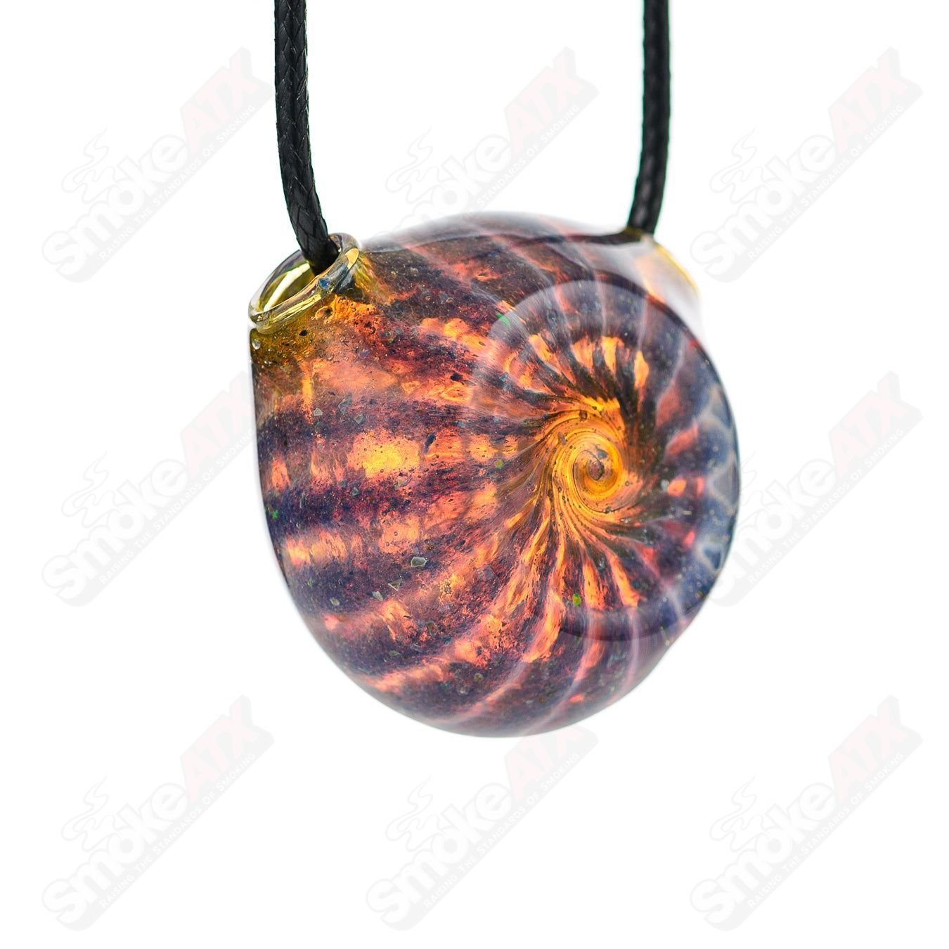 Colorful Dichro pendant made of glass from Merican Made, showcasing vibrant, shifting hues in a handcrafted jewelry piece.