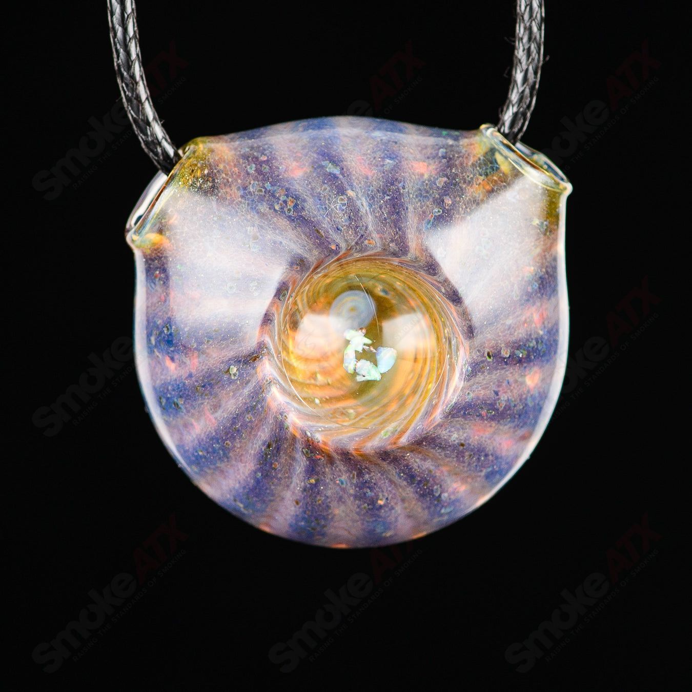 Colorful Dichro Pendant made of glass by Merican Made, featuring vibrant, iridescent hues on a sleek pendant design.