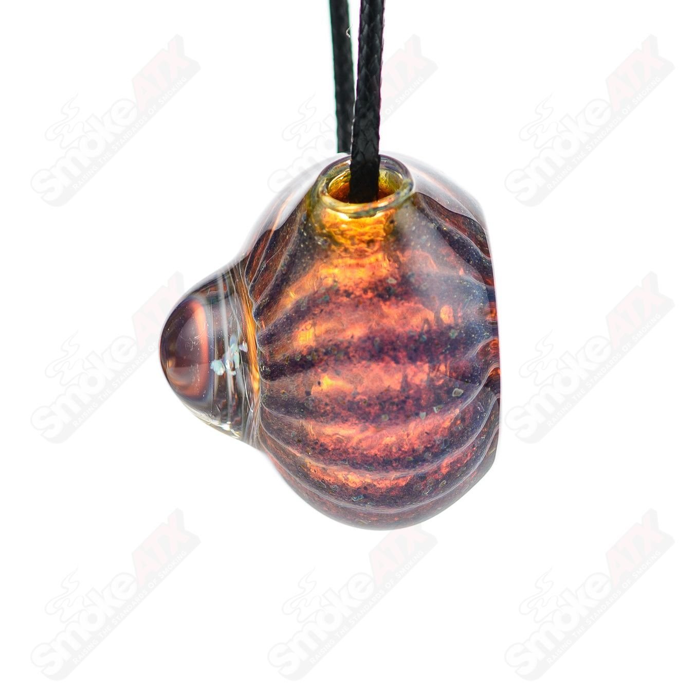 Colorful Dichro Pendant made of glass by Merican Made, showcasing vibrant iridescent hues and intricate design.