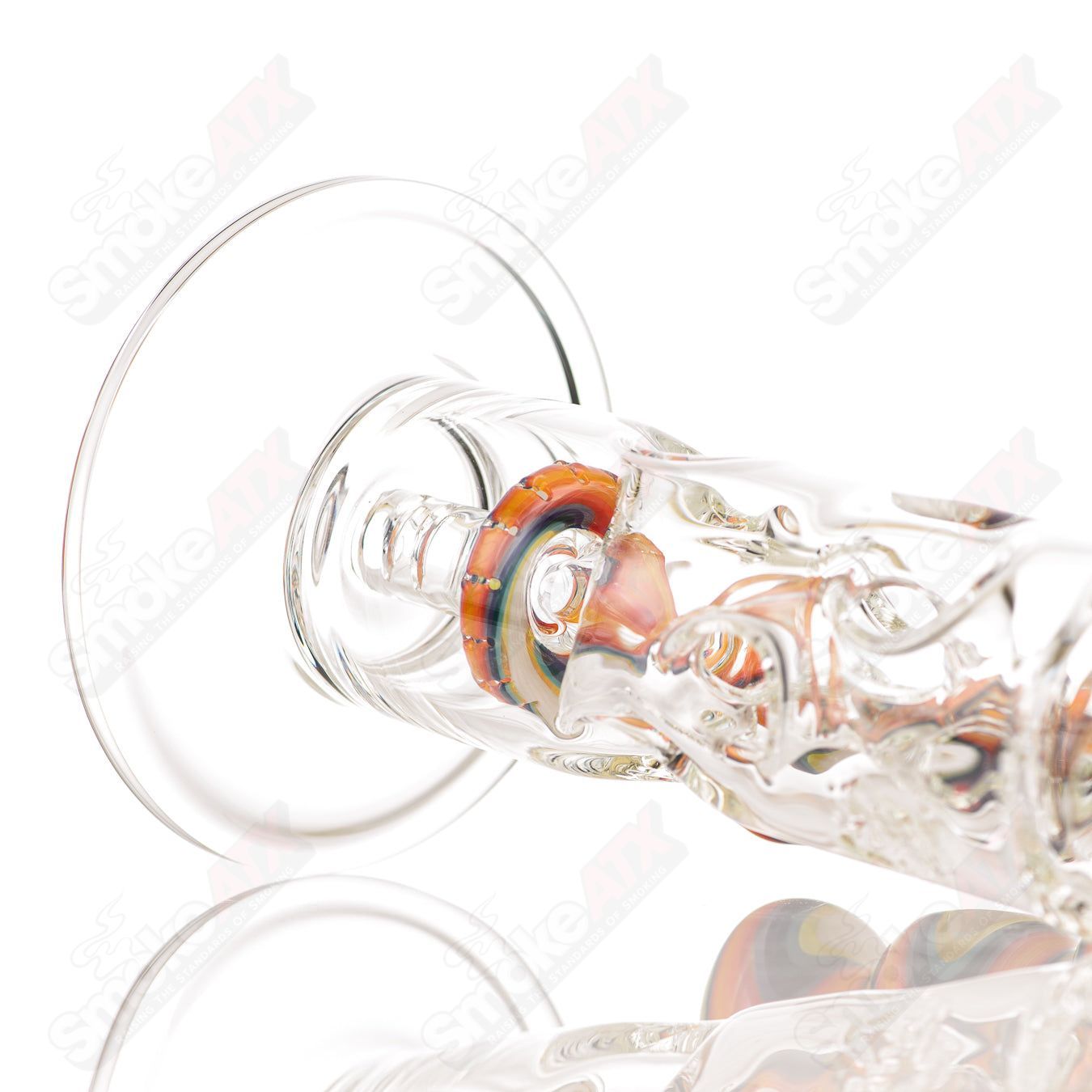 Glass donut ball rig by Texas Hot Glass, bubble-shaped bubbler with intricate glasswork, designed for smooth smoking experience.