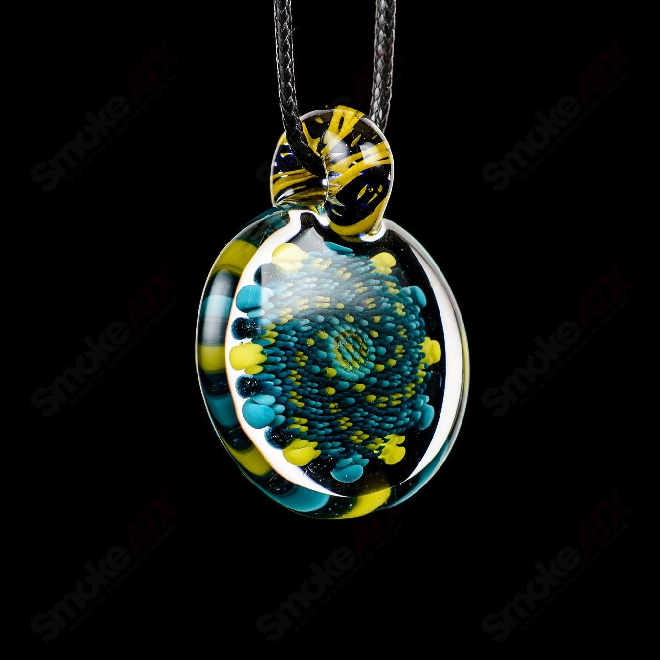 Glass Doticello Pendant Kit Kanz showing colorful glass pendant with intricate design and silver bail attachment.