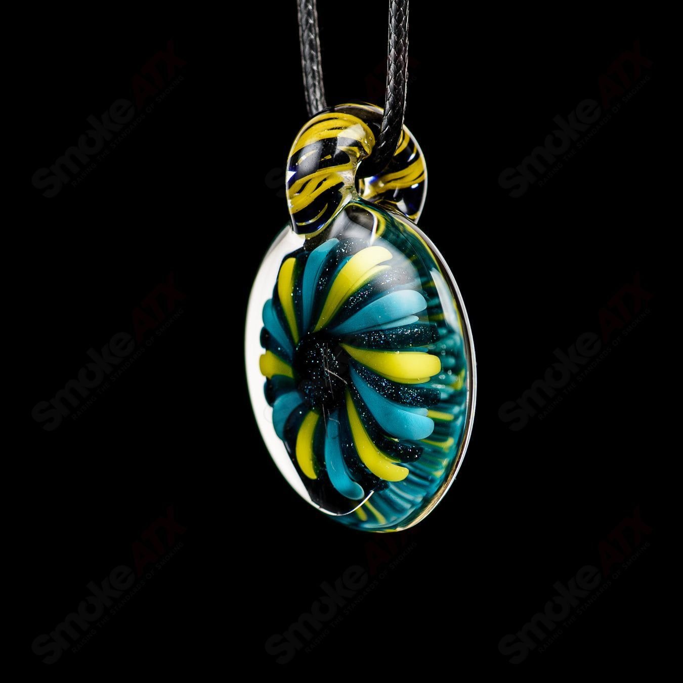 Glass Doticello Pendant Kit by Kit Kanz featuring a colorful, intricate glass pendant with a sleek gold-tone bail.