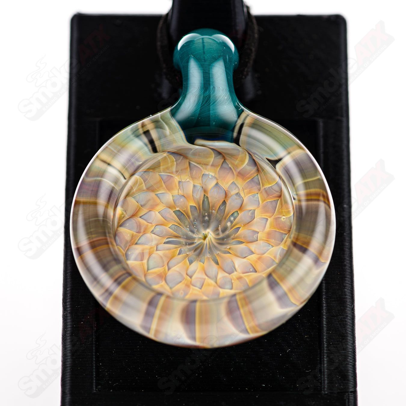 JuJu Glass Dotstack Pendant in vibrant glass with layered dot design, hanging on a silver chain.