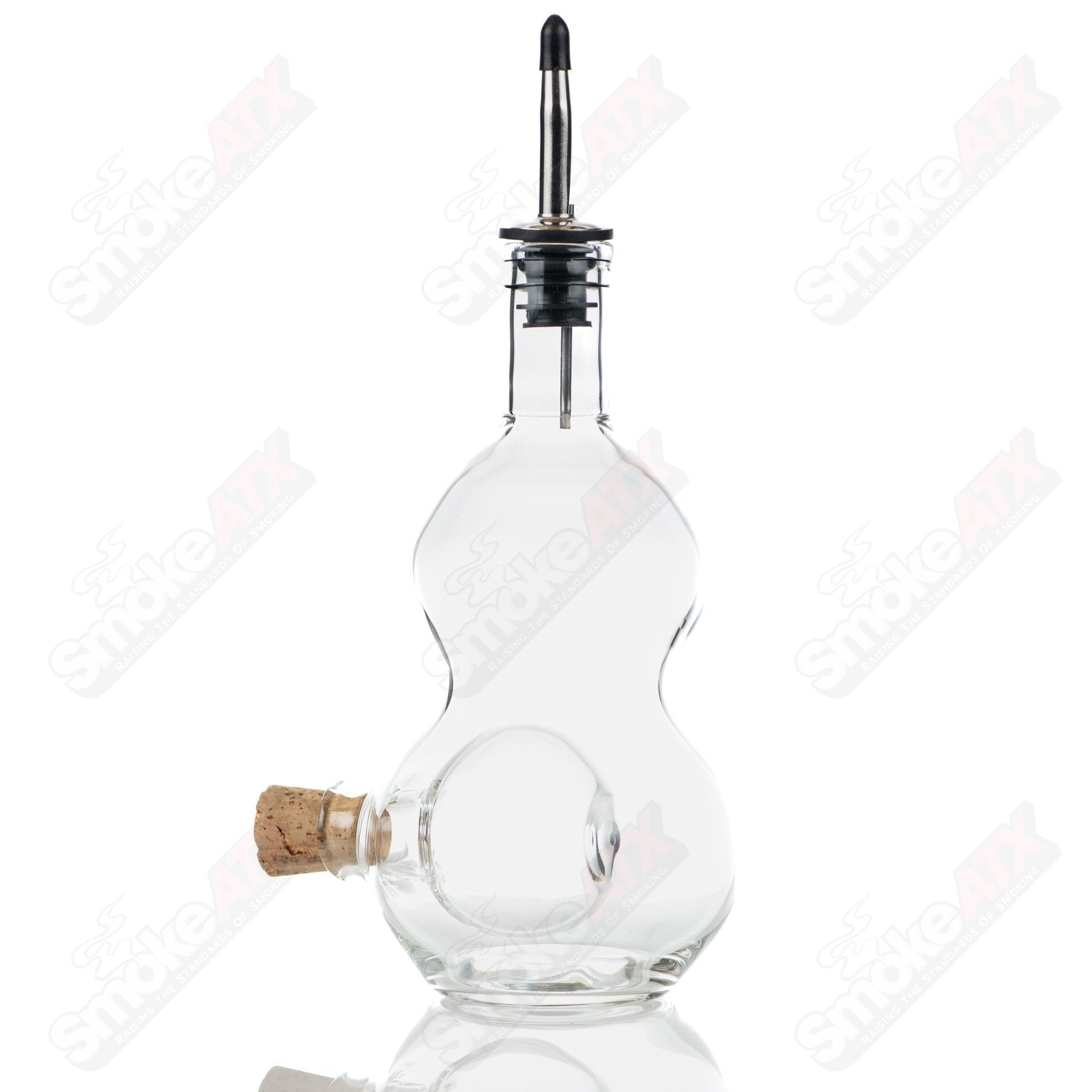 Texas Hot Glass double chamber liquor bottle and stash jar, clear heady glass with intricate design, ideal for storing spirits or herbs.