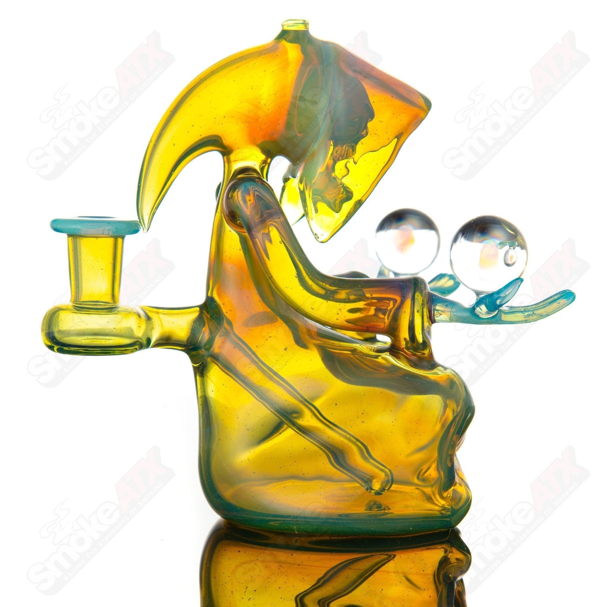 Joachim Glass double opal meditating reaper concentrate rig with intricate glass design and detailed reaper figure.