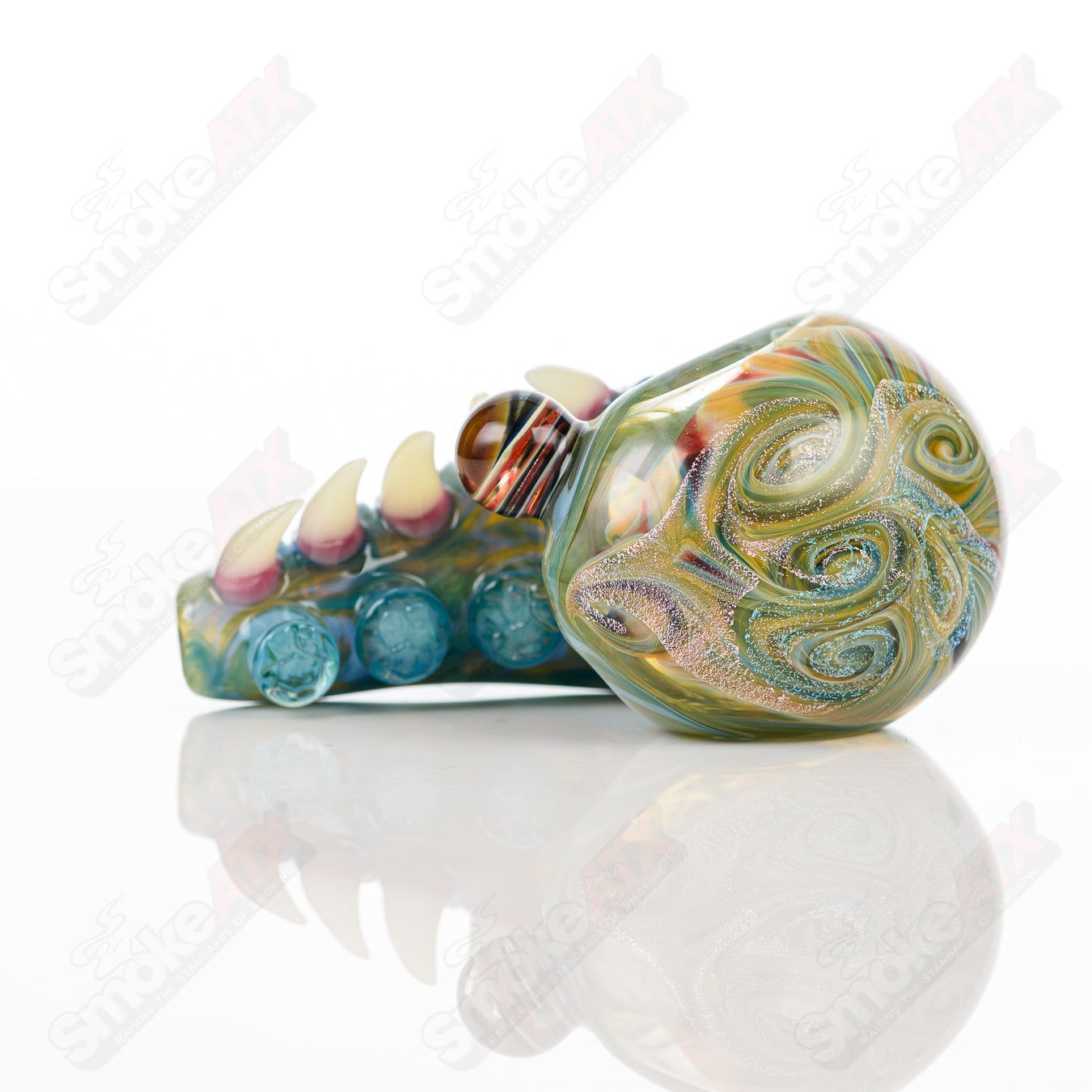 Hand pipe featuring a dichroic swirl marble design by Salt Glass, showcasing vibrant colors and intricate heady glass craftsmanship.