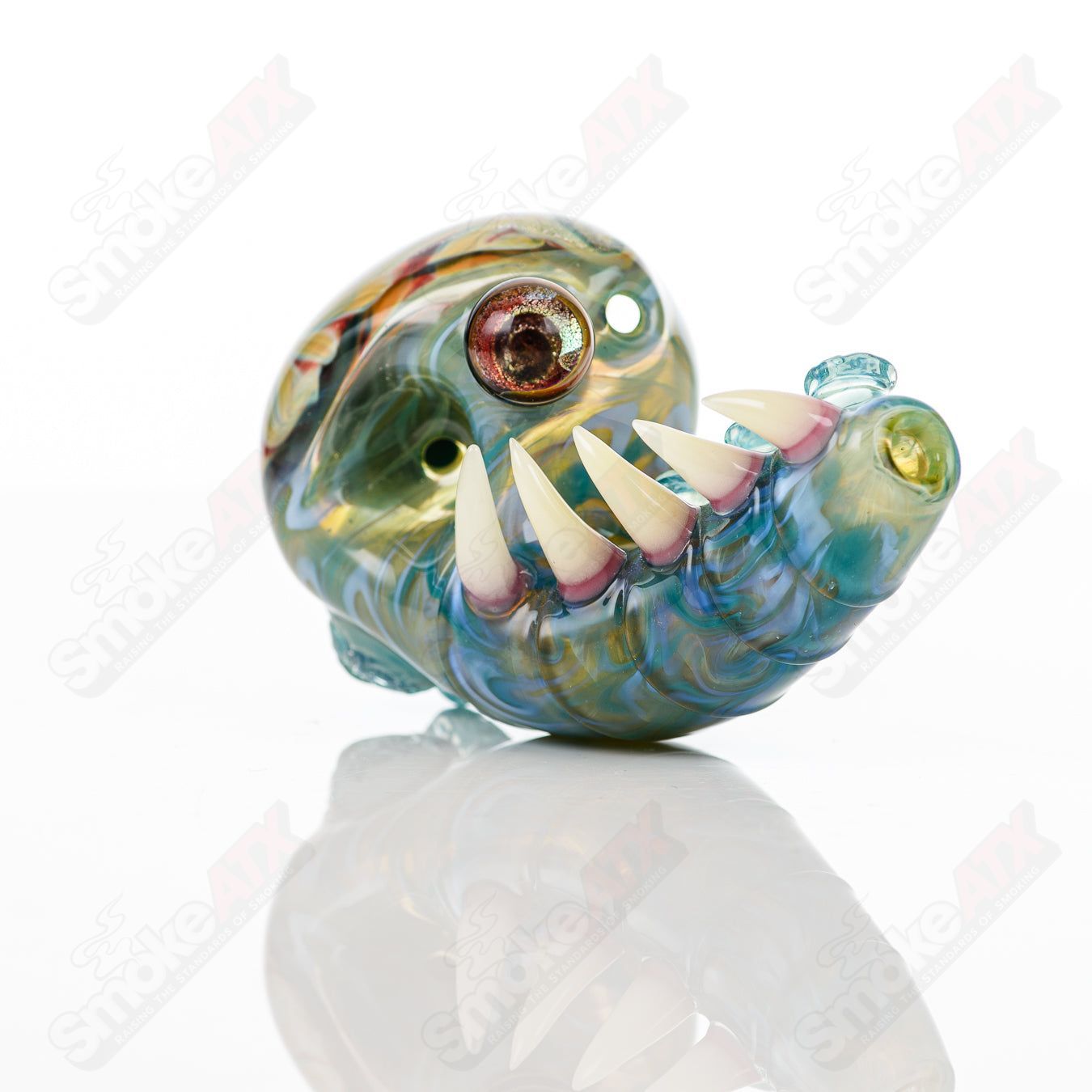 Hand pipe from Salt Glass featuring a dichroic swirl marble design in galactic glass, showcasing vibrant colors and intricate details.